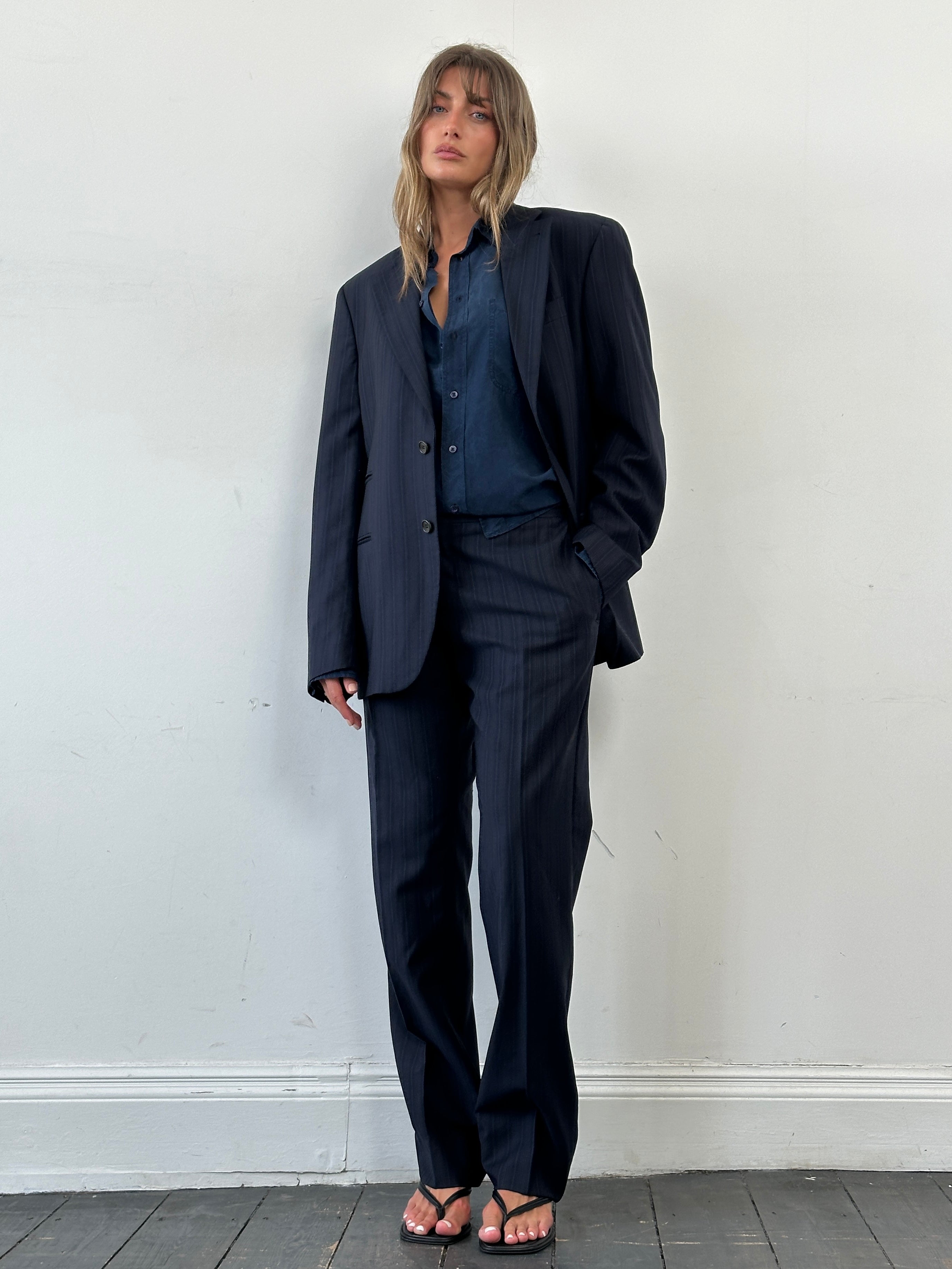 Daniele Alessandrini pure wool single-breasted jumpsuit in size 42R/W34, tailored fit with lapel collar and front button closure.