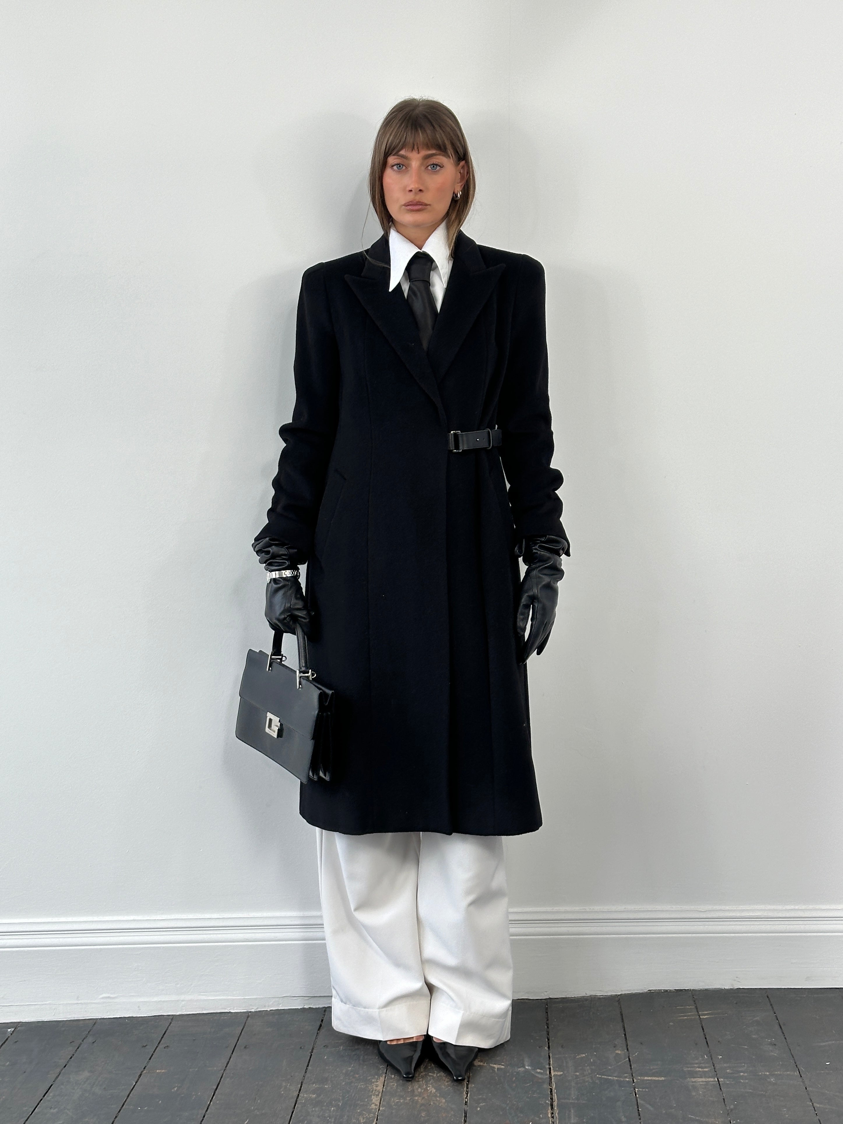 L.K. Bennett pure wool minimal wrap coat in neutral color, stylish and tailored, shown on a hanger.