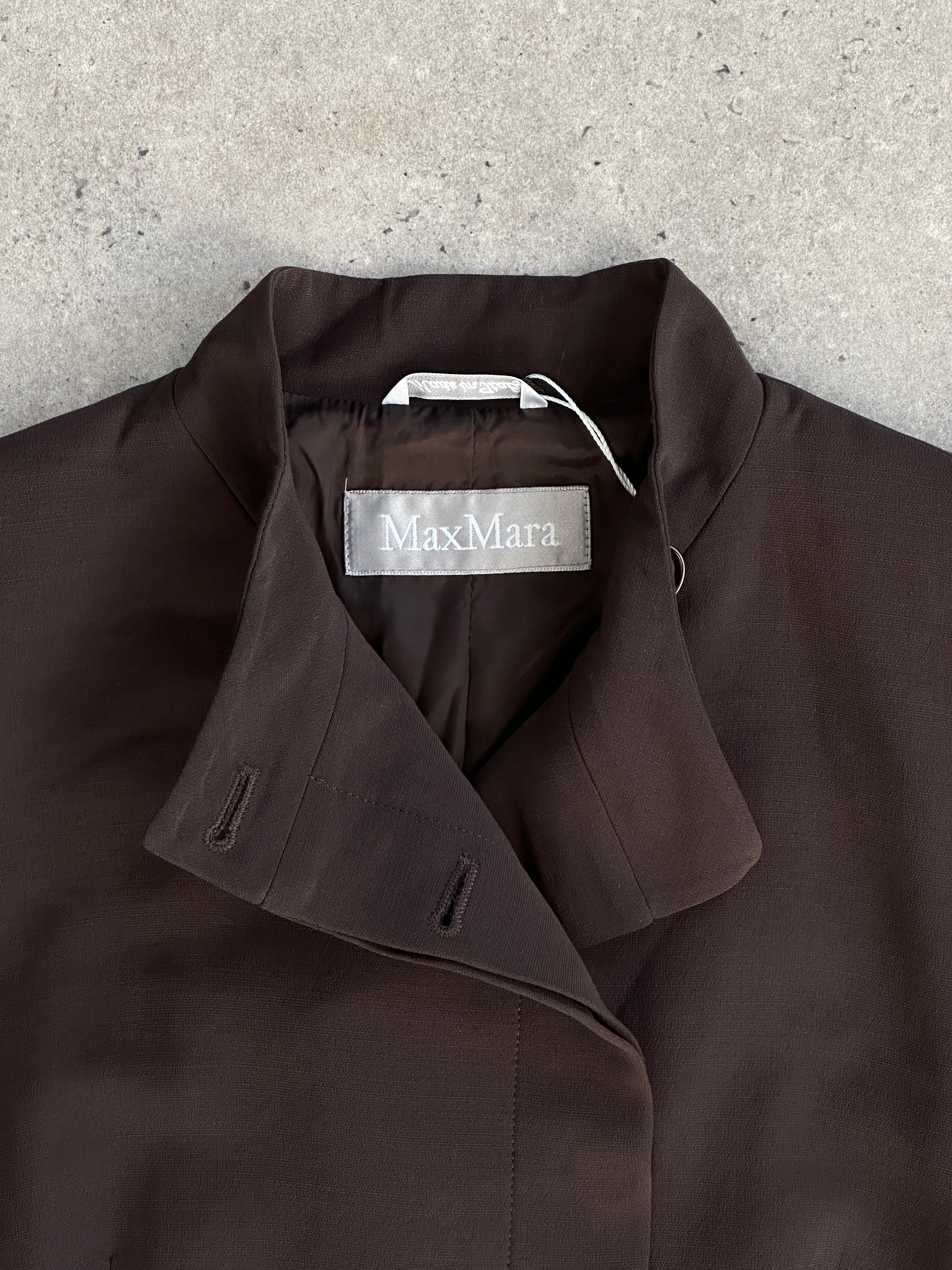 Max Mara 2000s fitted high neck asymmetric tailored blazer, black with structured design and long sleeves, front closure.