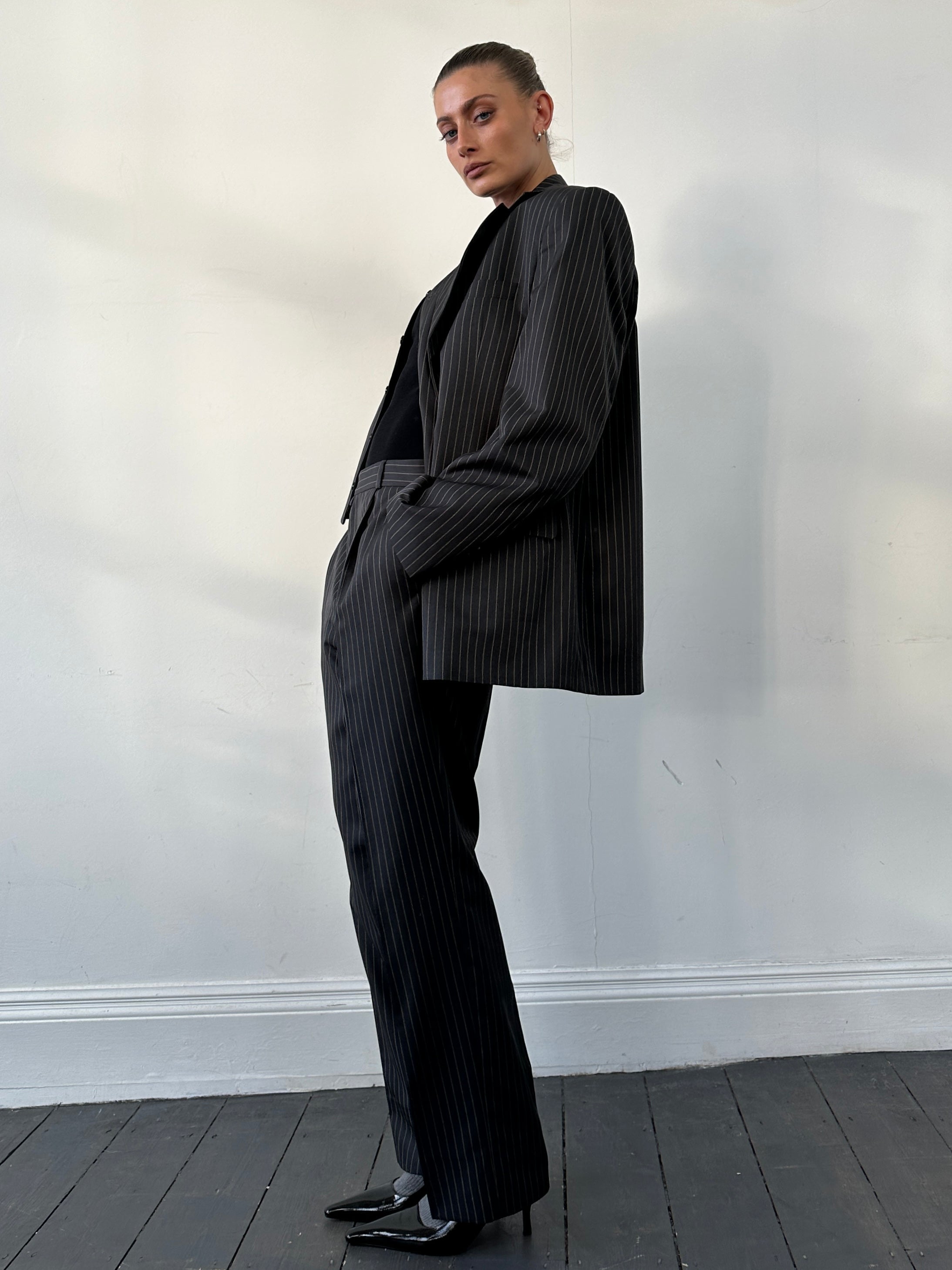 Vintage Italian vintage pinstripe cotton three-piece suit in size 40R/W32, featuring tailored jacket, vest, and trousers.
