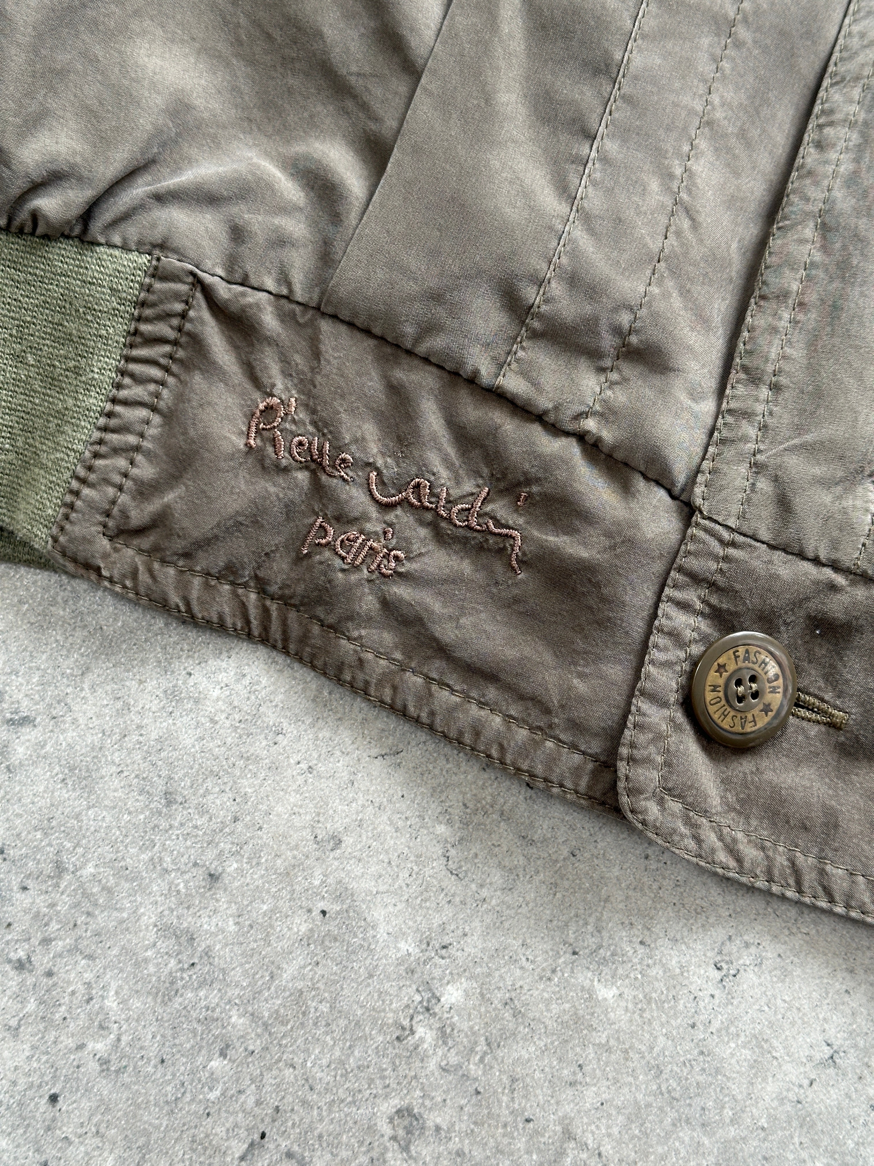 Pierre Cardin XXL pure silk slouchy bomber jacket displayed on a hanger, showcasing its relaxed fit and smooth silk fabric.