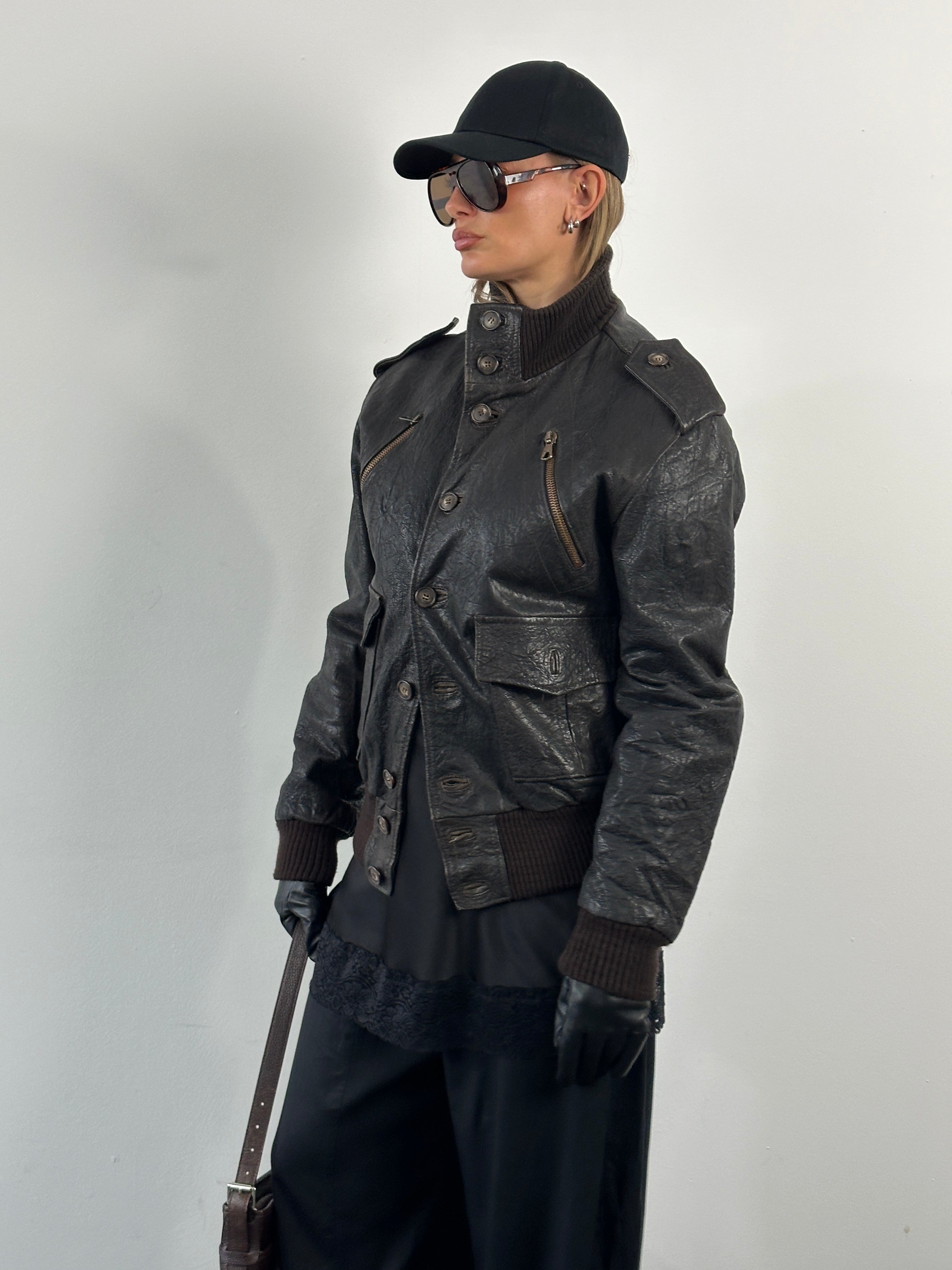 Vintage Italian 2000s textured leather bomber jacket with high neck, size large, featuring a classic vintage leather jacket design.