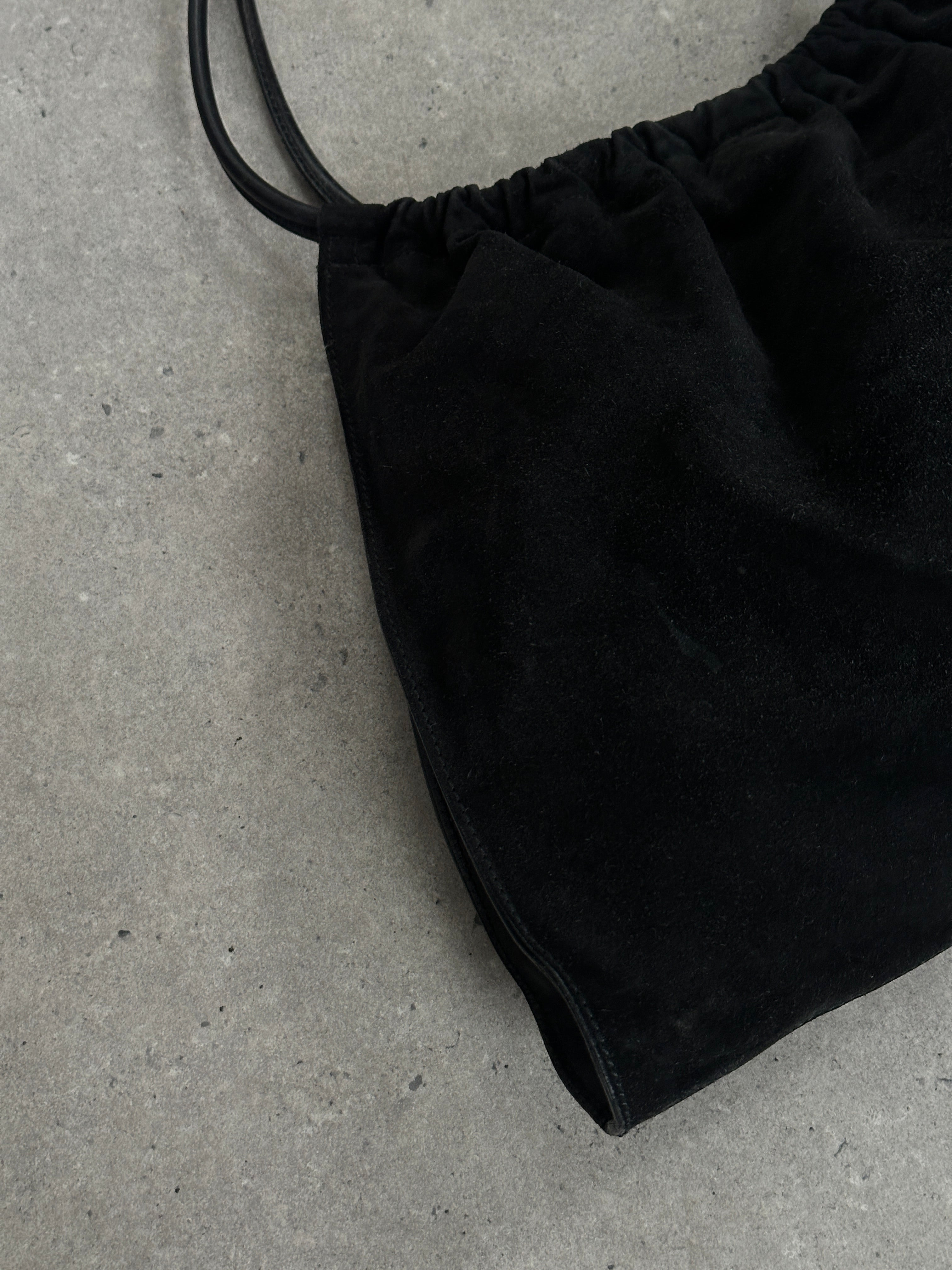 Gucci 1990s Tom Ford suede leather hobo shoulder bag with slouchy design and spacious interior.