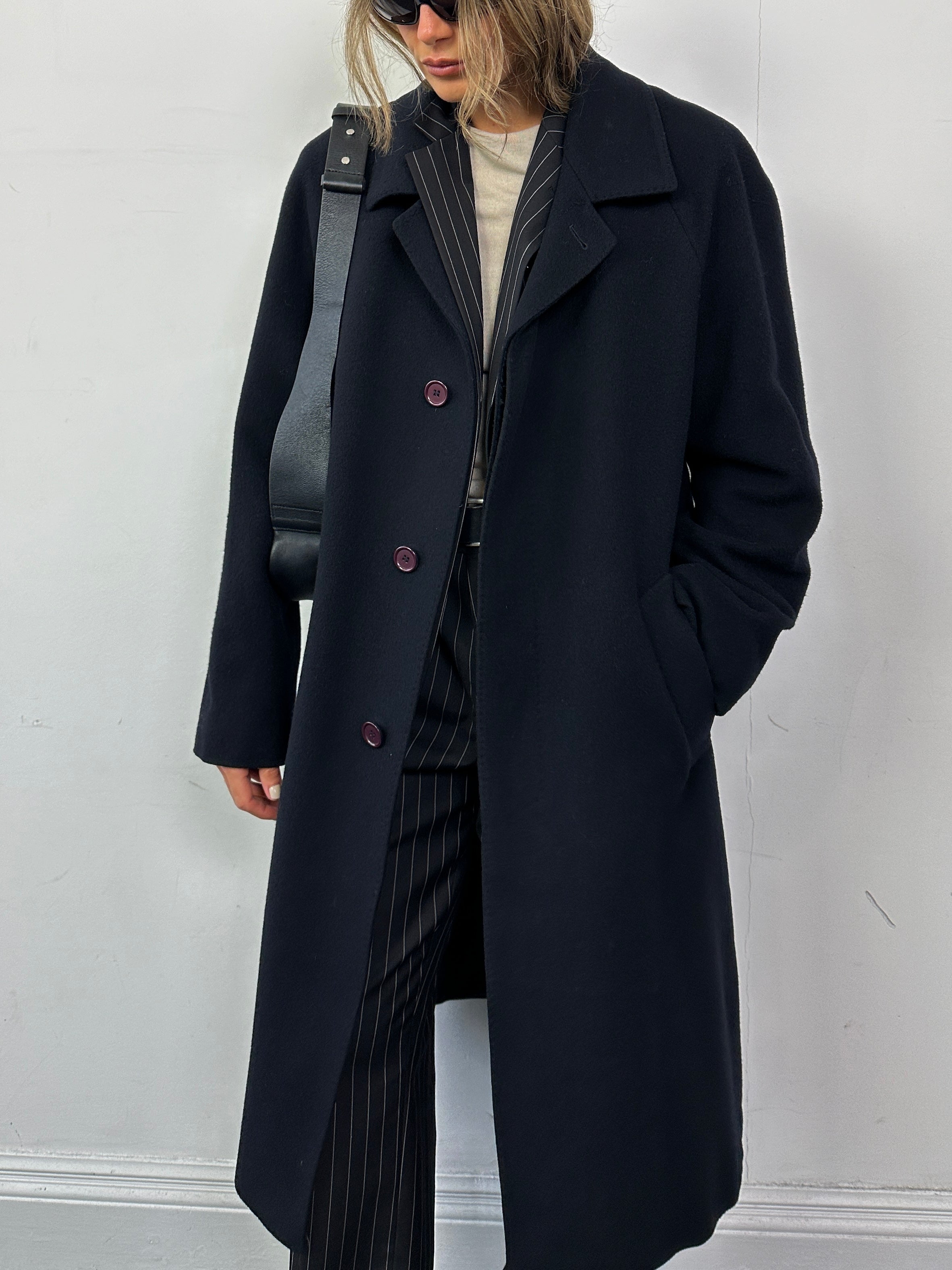 Vintage Italian wool and cashmere coat with concealed placket, shown in size L/XL, featuring a classic, textured fabric and tailored fit.