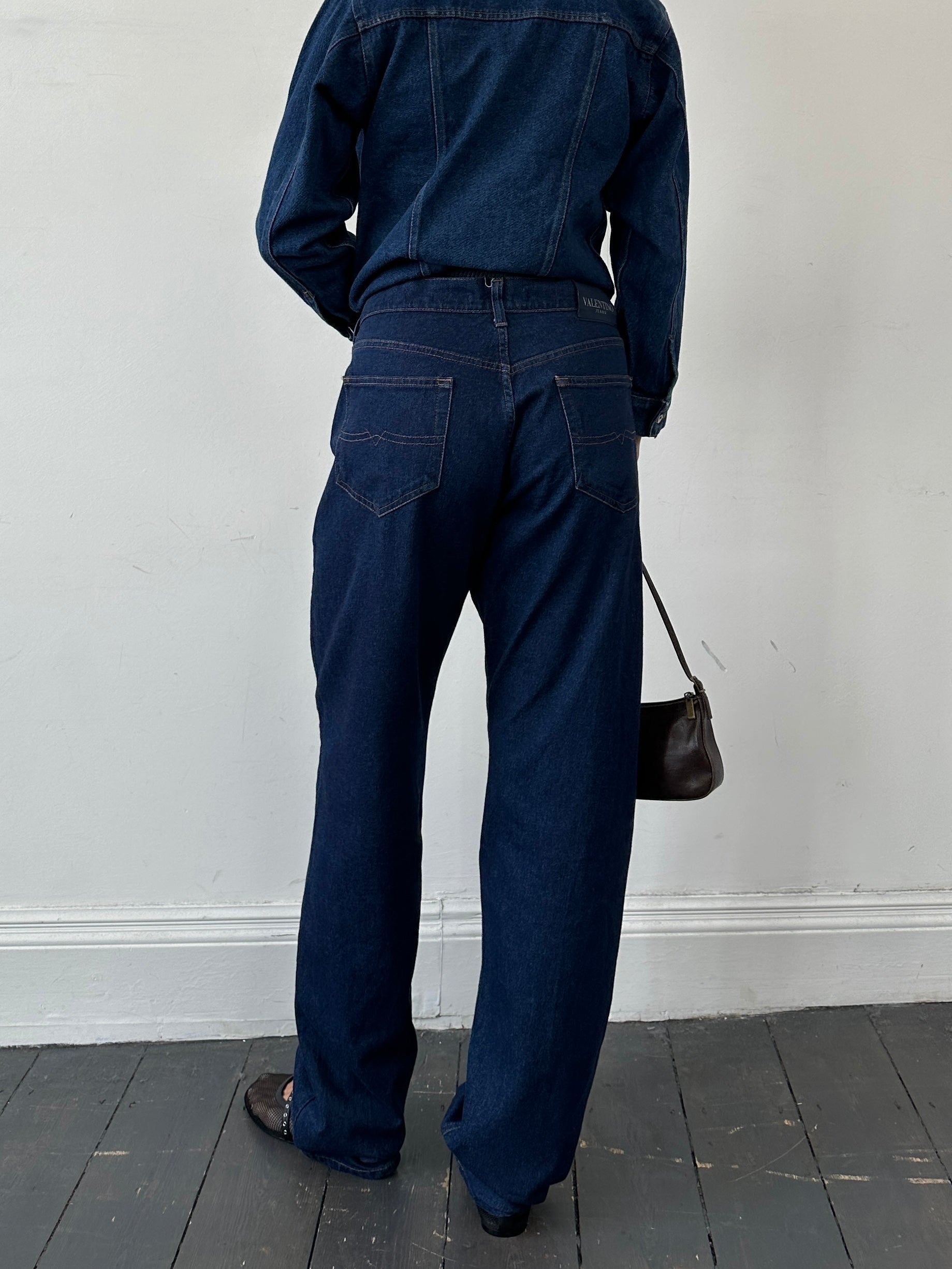 Valentino high waisted straight leg denim jeans in W34, showcasing classic blue denim with a fitted waist and relaxed fit.