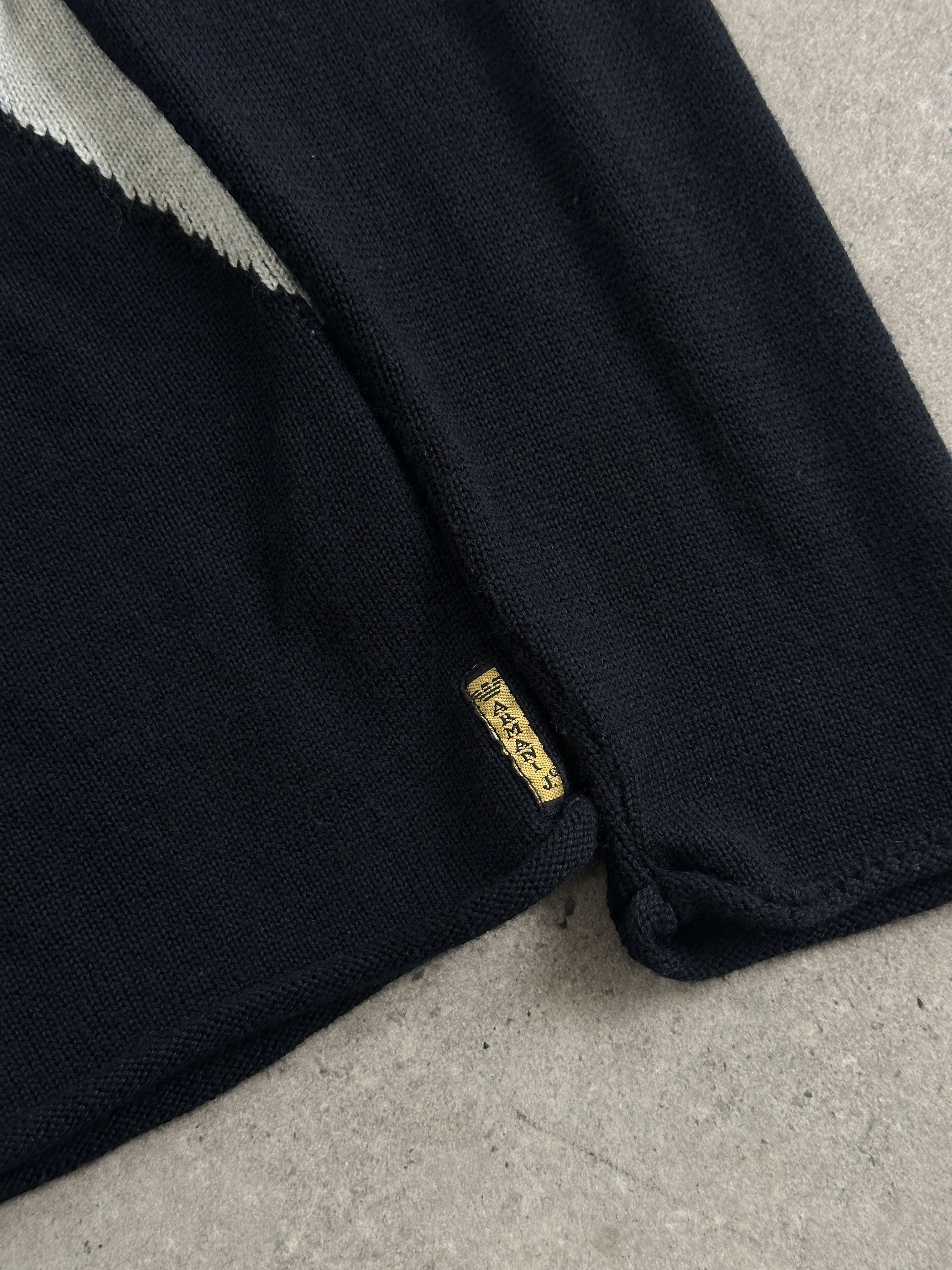 Armani Jeans virgin wool knitted logo jumper in size M/L, featuring a classic design with the Armani logo on the chest.
