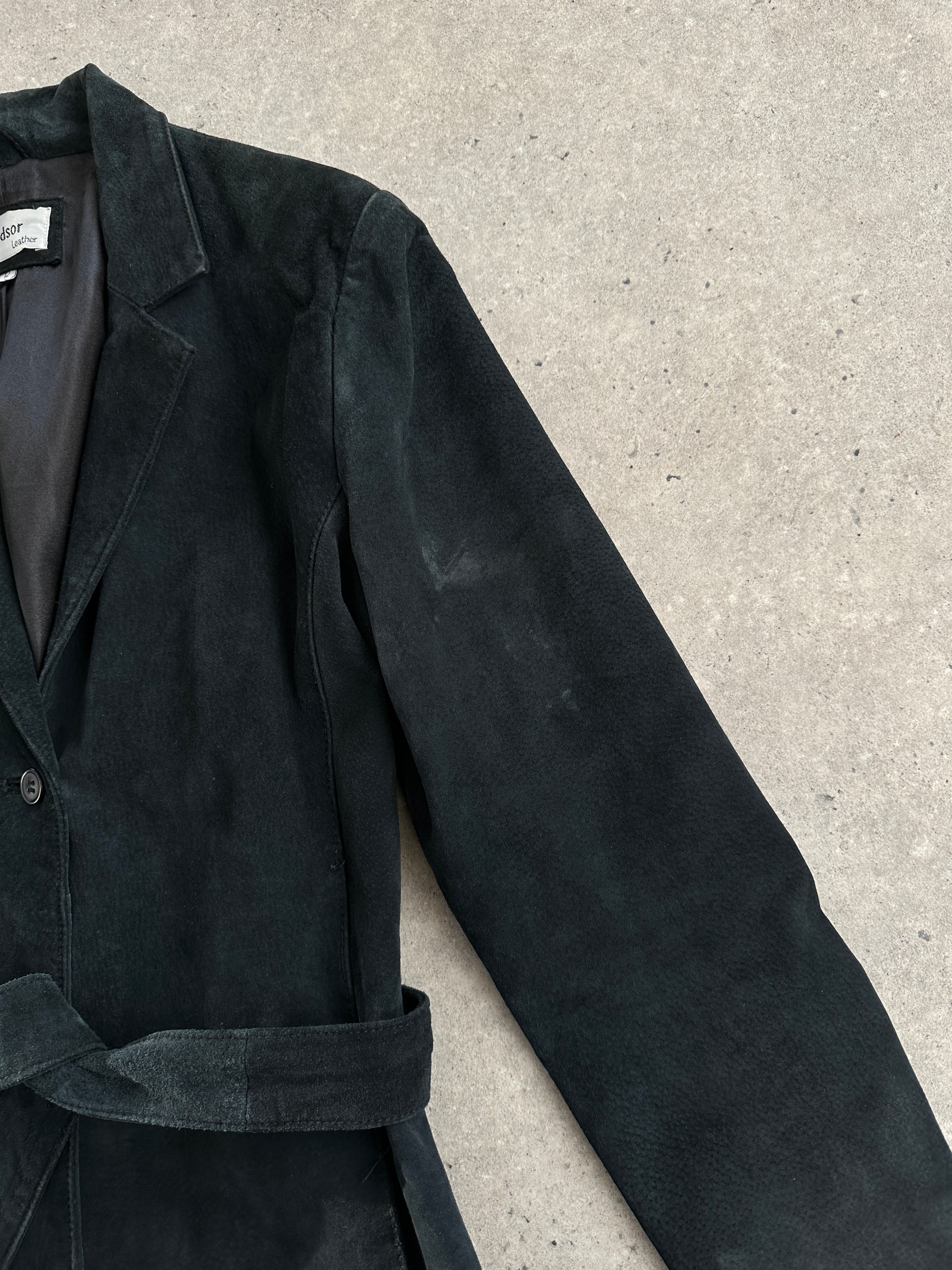 Vintage 1990s suede belted leather jacket, size S/M, with classic design and tailored fit, shown on a hanger.