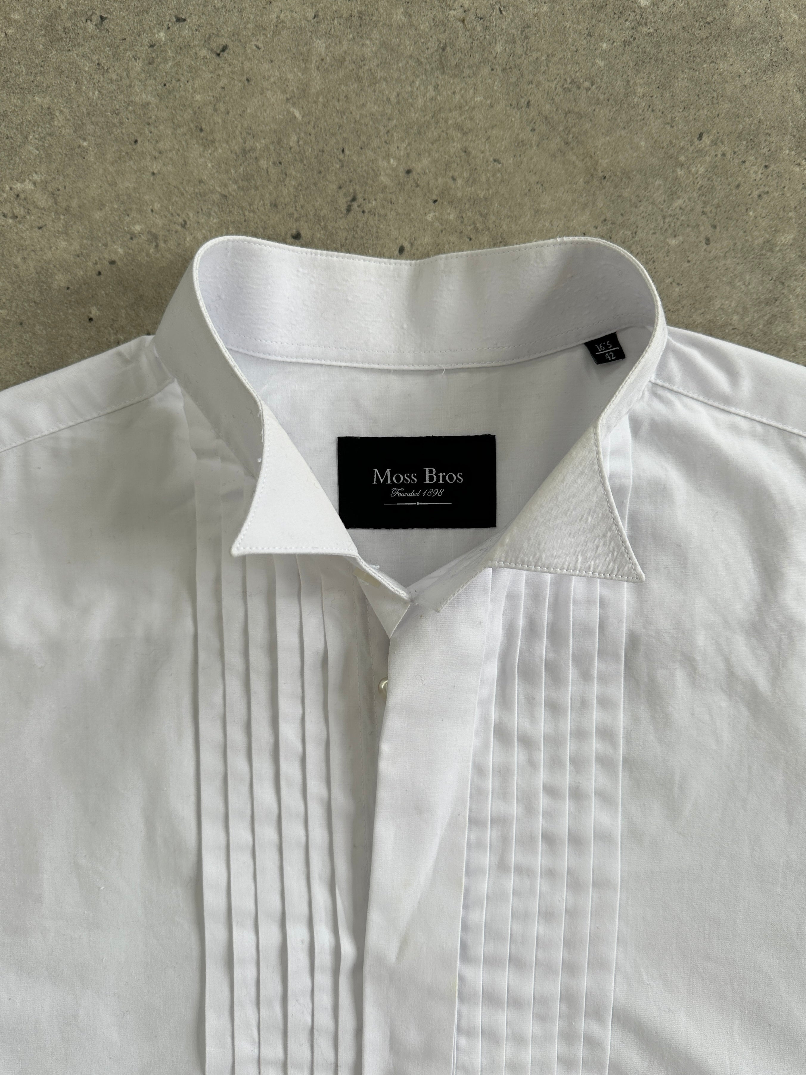 Vintage brand vintage tuxedo wing collar dress shirt in size L/XL, featuring classic design and crisp white fabric.