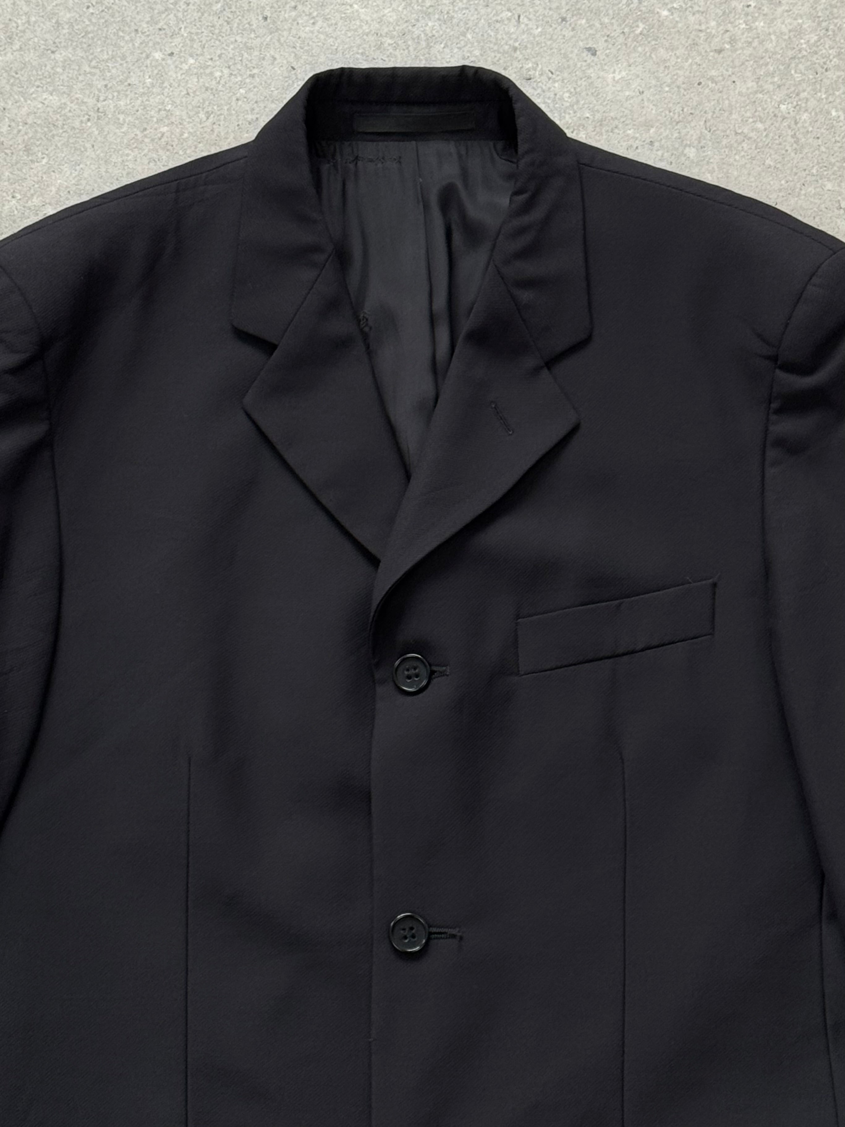Yves Saint Laurent Pour Homme 1990s pure wool blazer in size 40R/L, tailored fit with classic lapel and button closure.