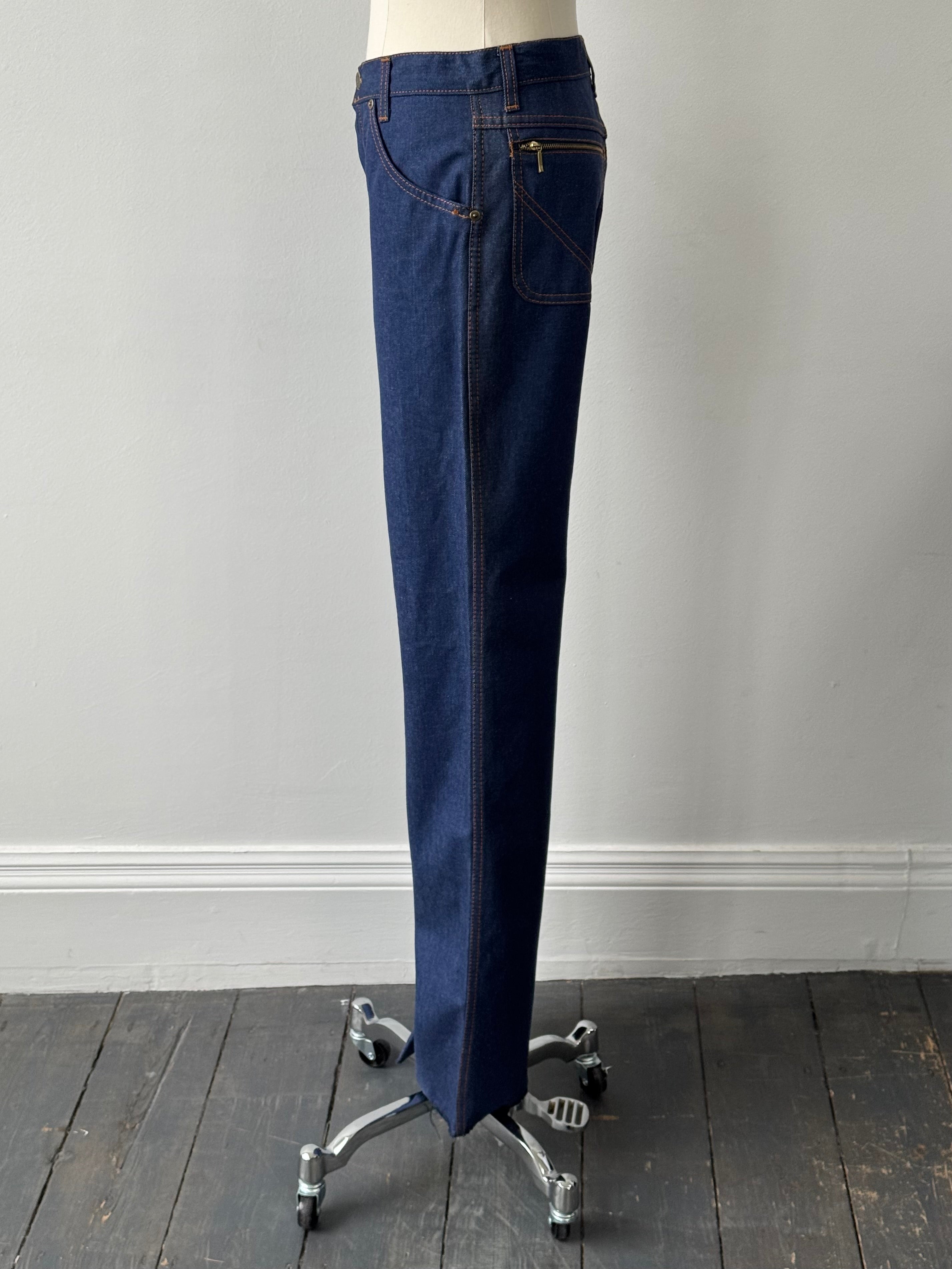 Vintage Italian 1990s high-waisted straight leg denim jeans, W28, with classic blue wash and vintage detailing.