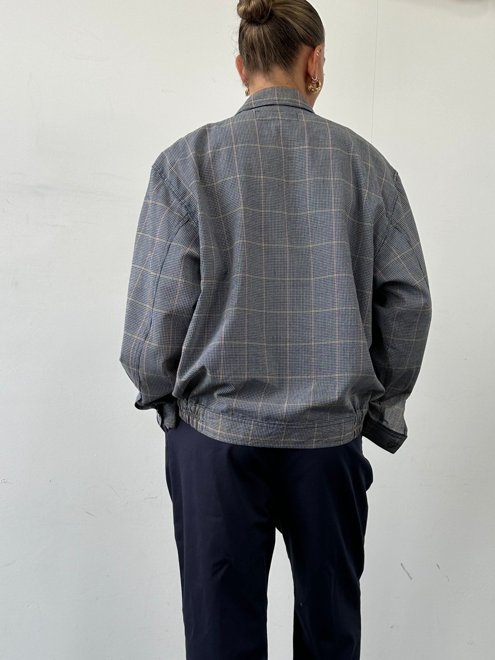 Yves Saint Laurent Pour Homme check logo bomber jacket in size L, featuring a stylish design and signature branding.
