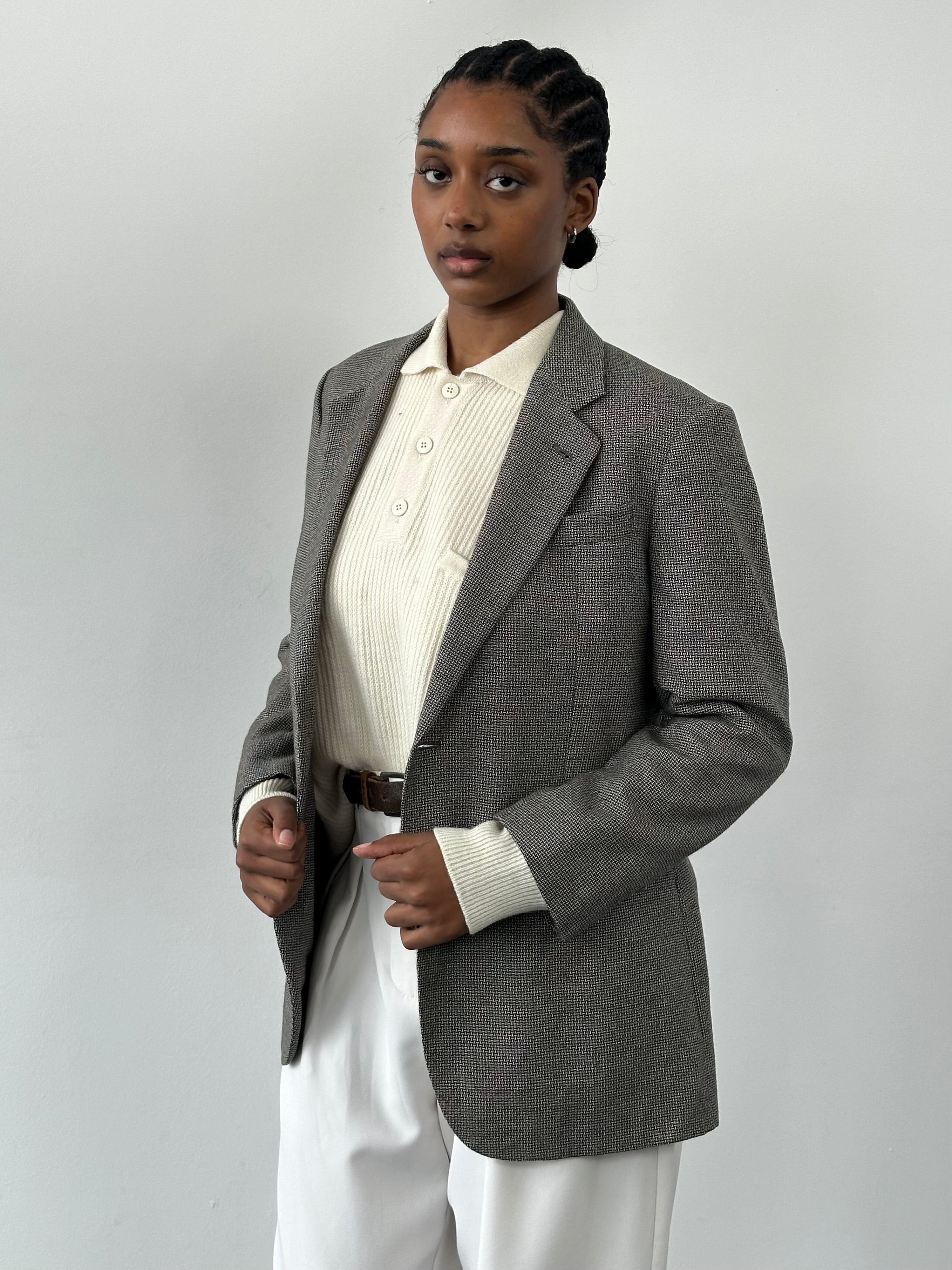 Burberry 1990s herringbone wool silk single-breasted blazer in size 36S, showing classic tailored fit and herringbone pattern.