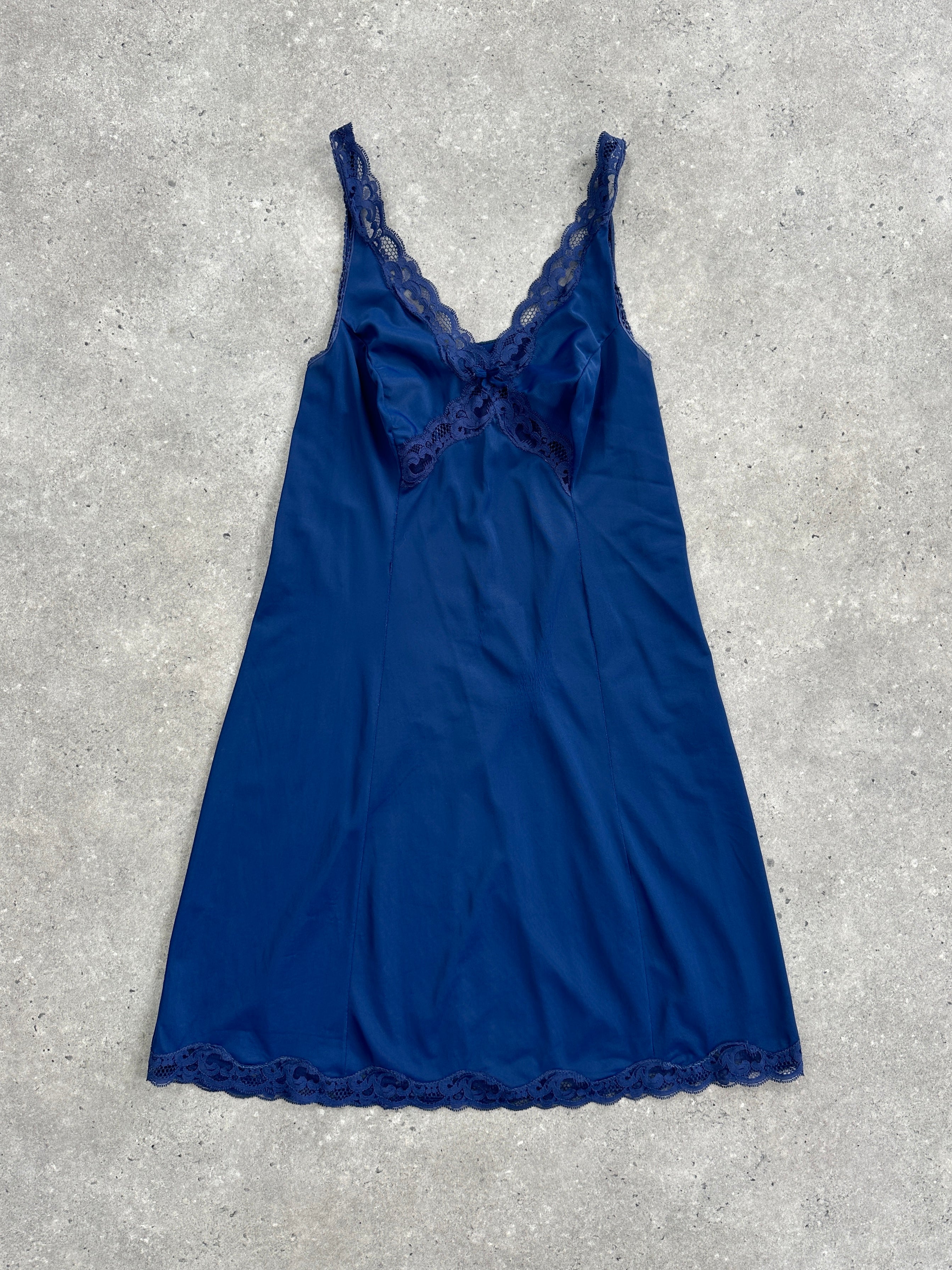 Vintage 1980s lace sheer mini slip dress, size small, featuring delicate floral lace and lightweight satin fabric.