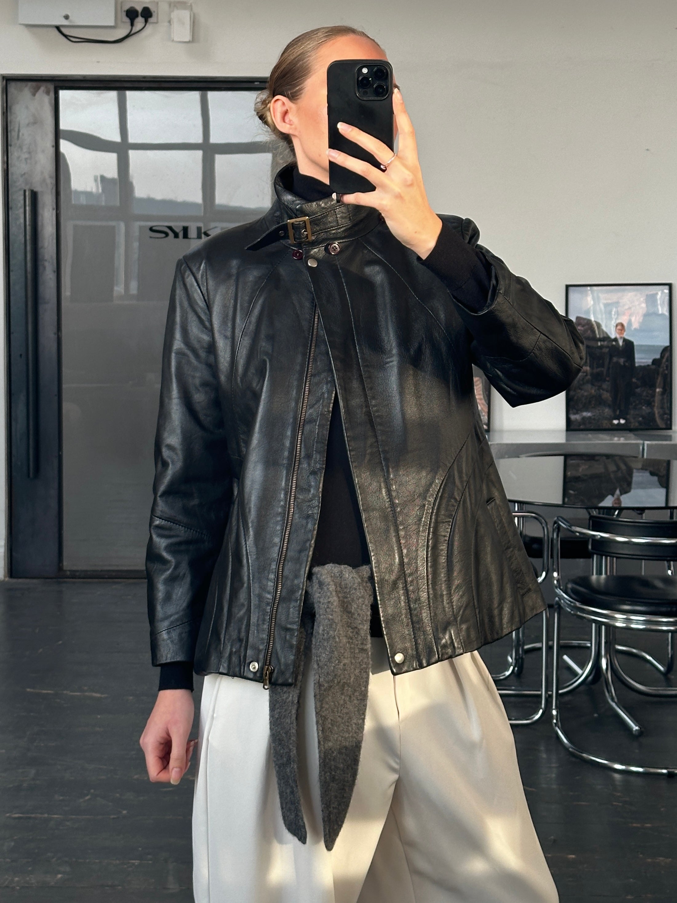 Vintage Italian 1990s high neck leather jacket in size M, showcasing classic design and rich leather texture.