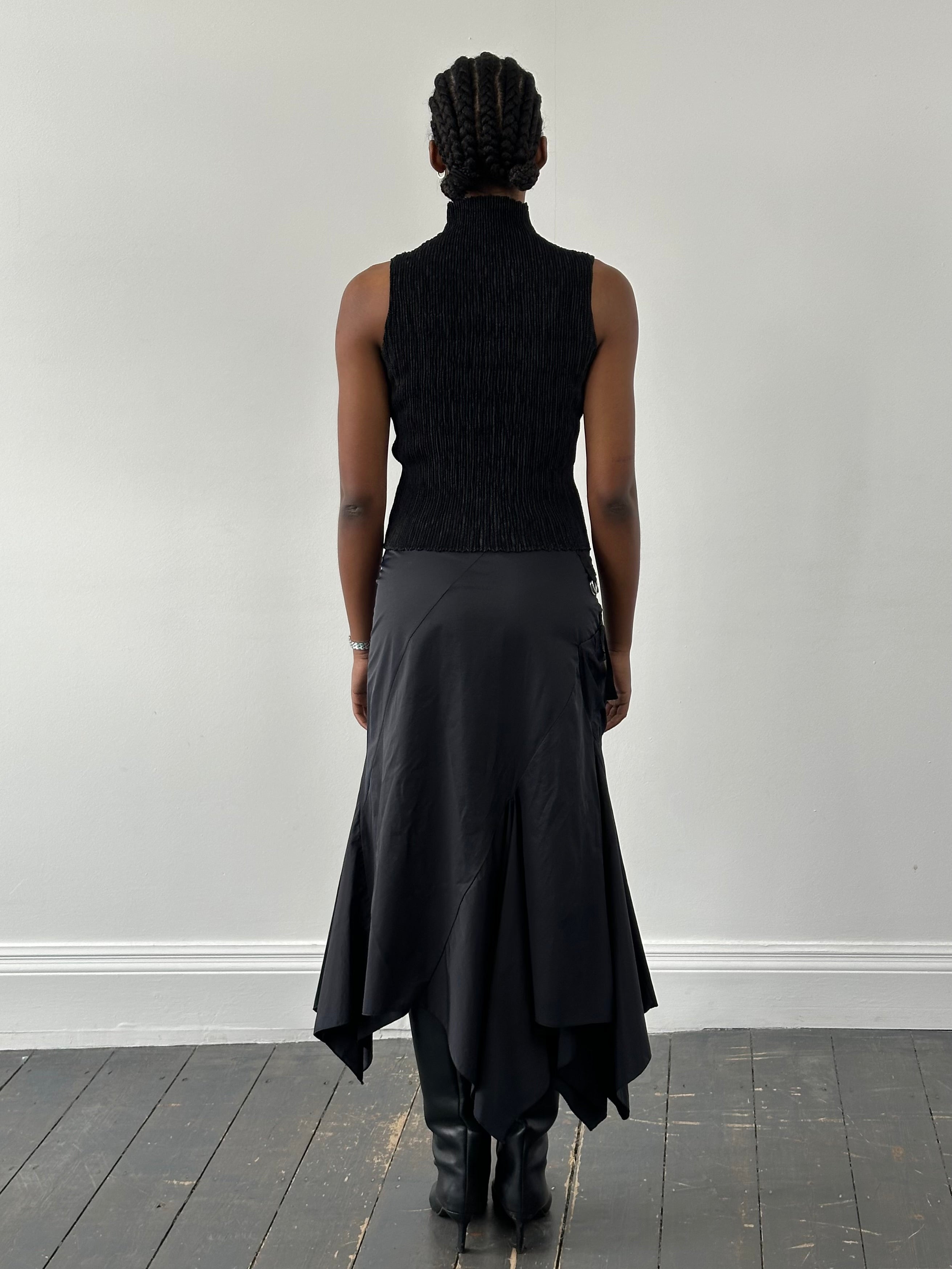 Vintage 1990s cotton ruffle skirt with multiple zippers, size W28, featuring a retro-inspired design and floral print.