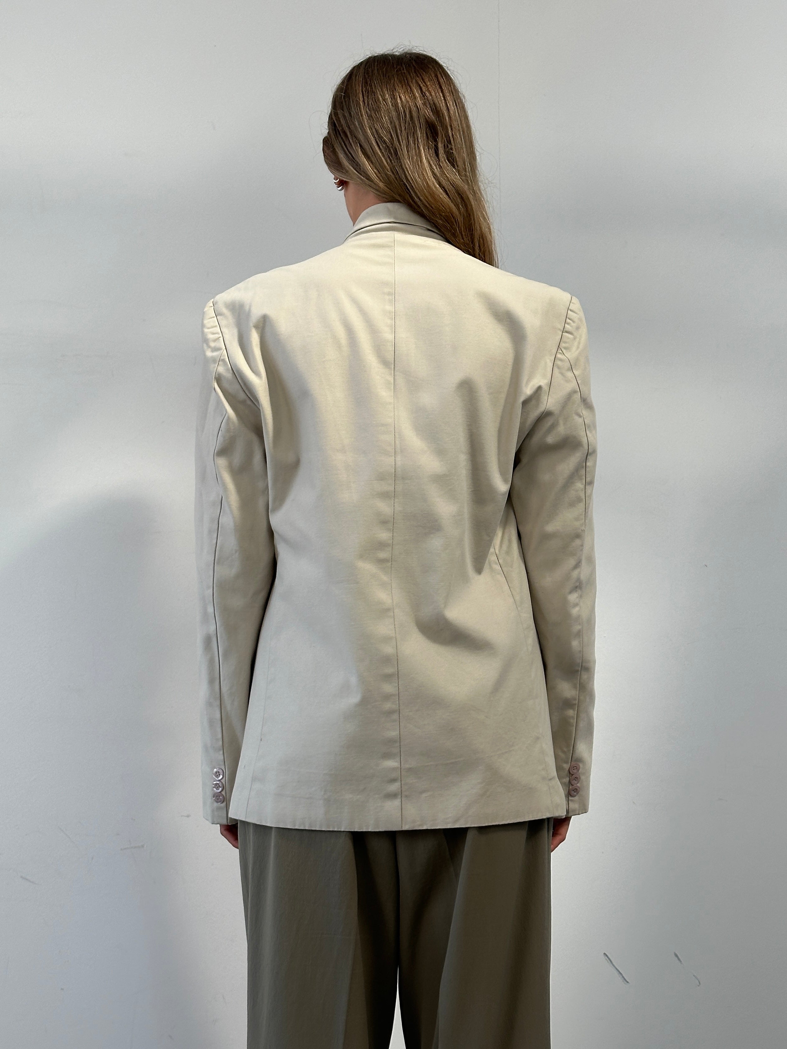 Vintage cotton single-breasted blazer in size L, featuring classic tailored design and button closure.