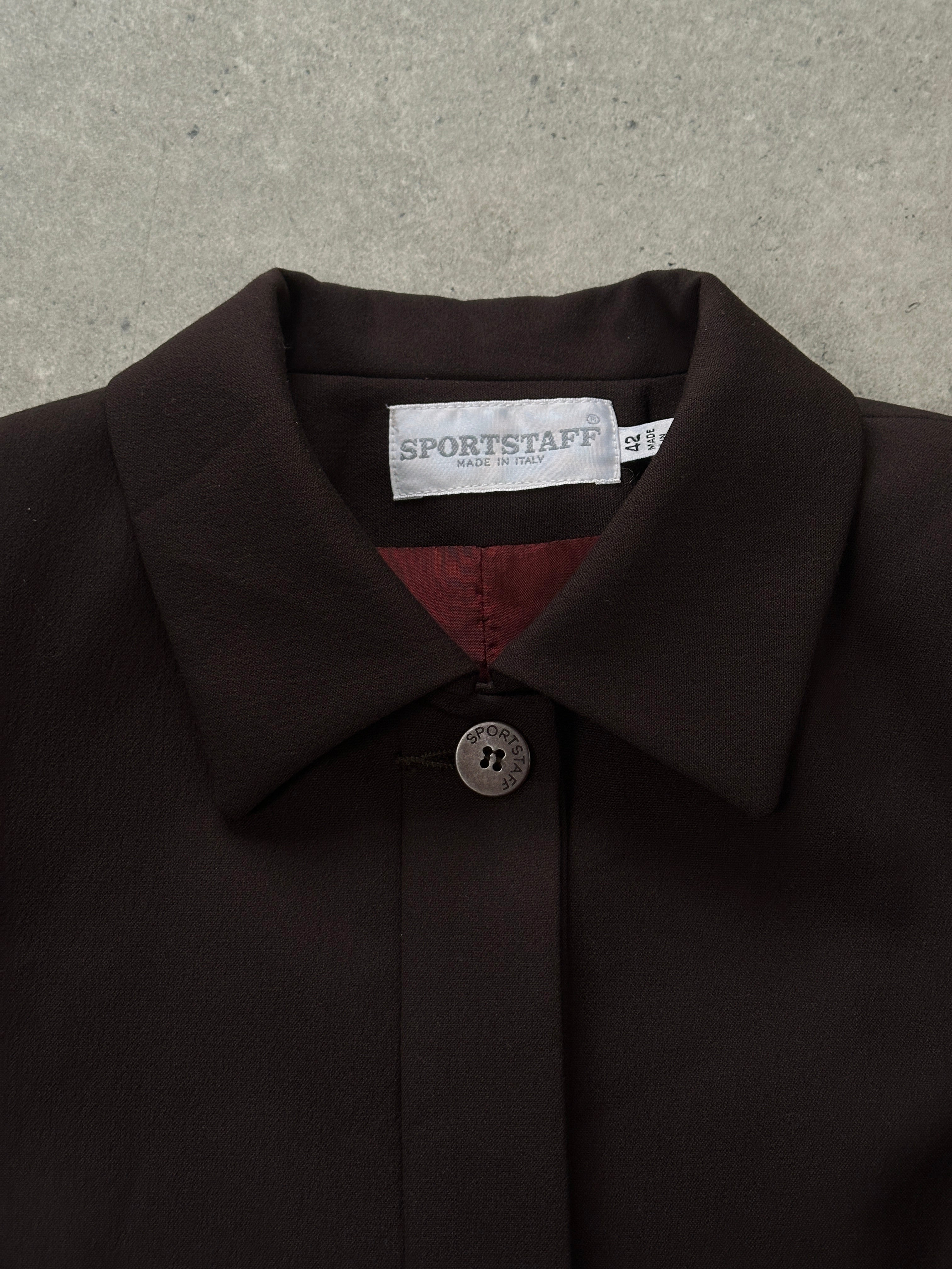 Vintage Italian 1990s minimal tailored coat in XS/S, showcasing sleek design and classic craftsmanship.
