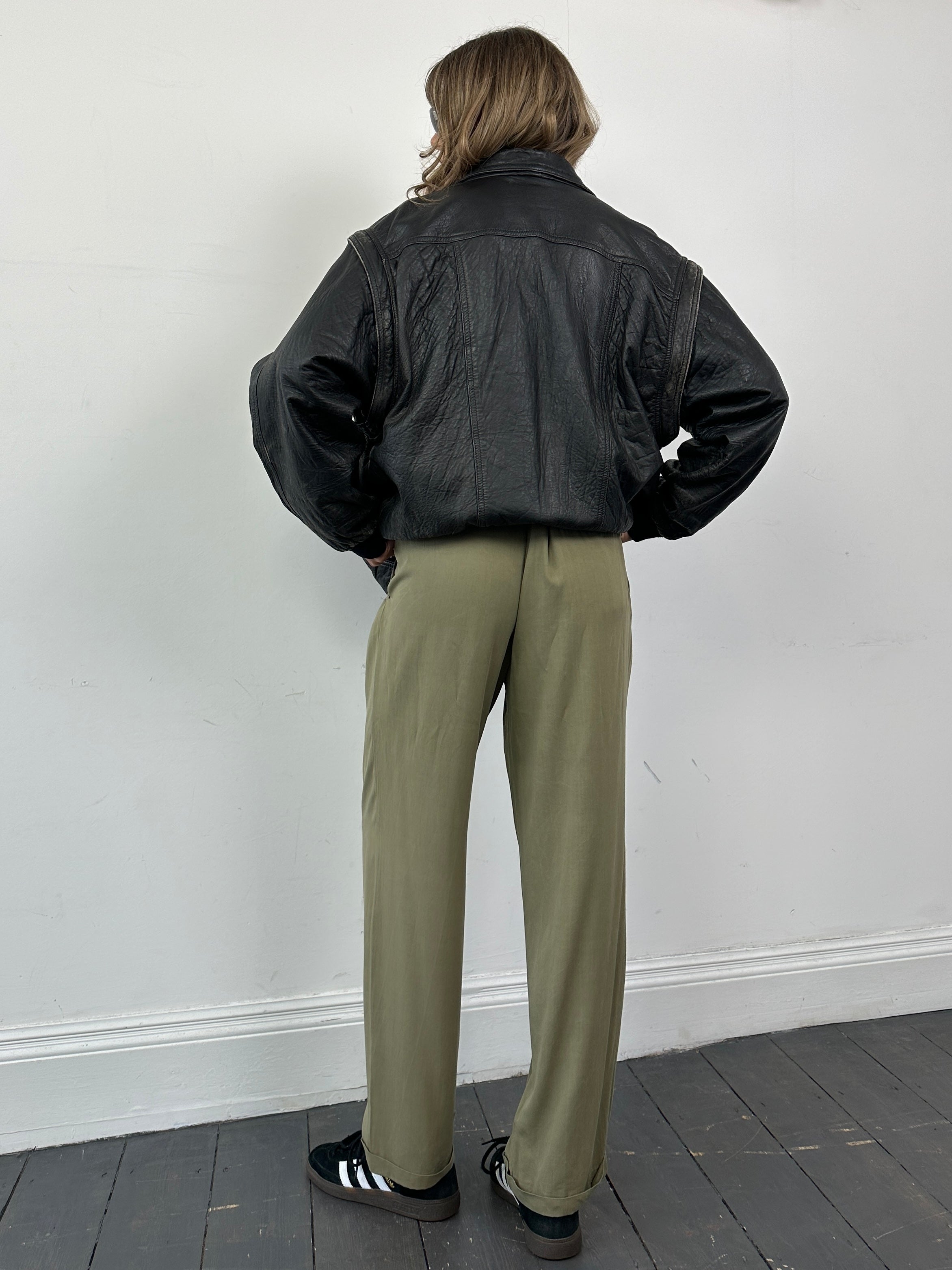 Versace Versus silk high-waisted straight leg trousers in W32, featuring smooth fabric and tailored fit.