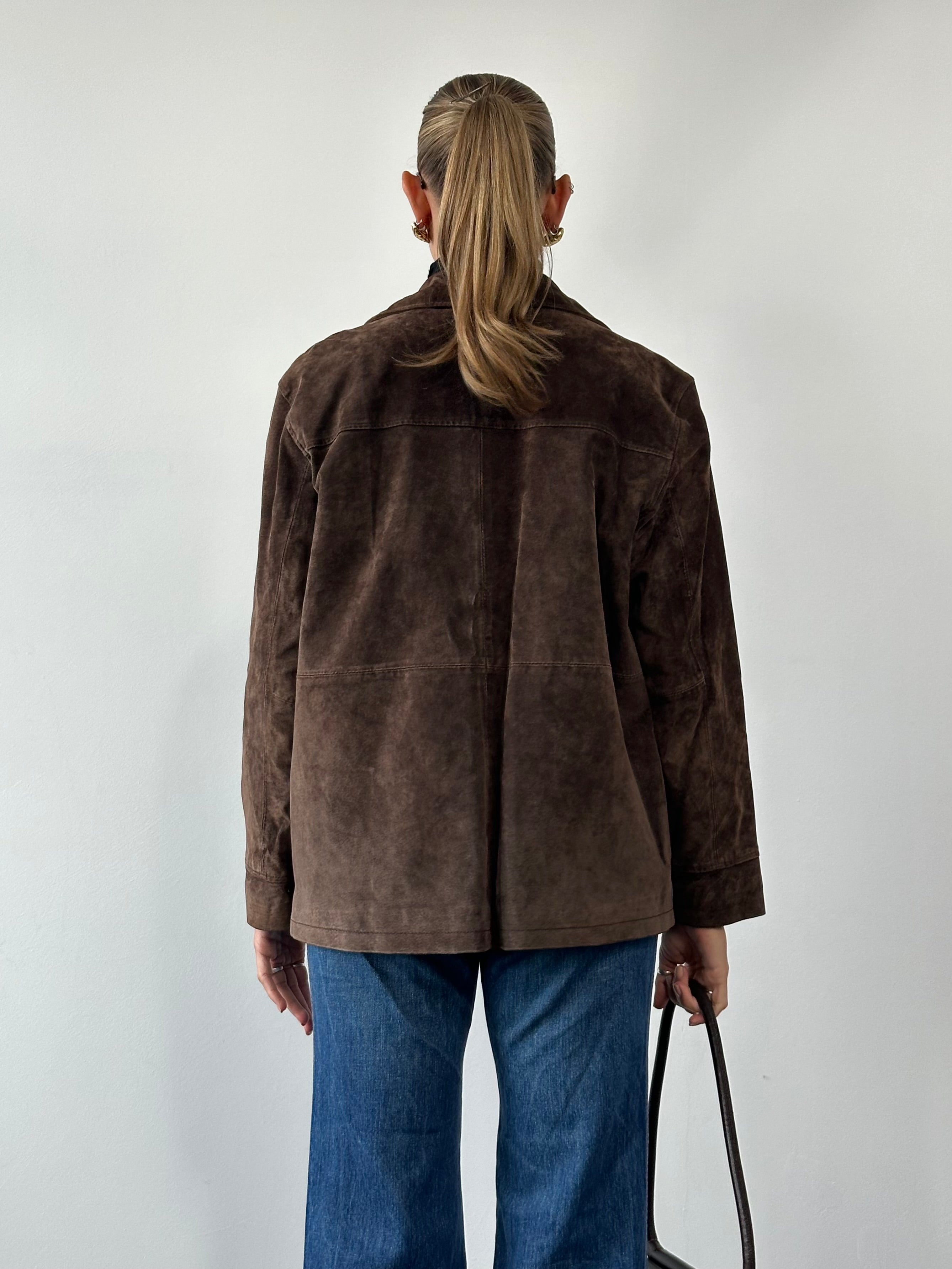 Vintage leather jacket in size L with a classic suede finish, featuring a tailored fit and timeless design.