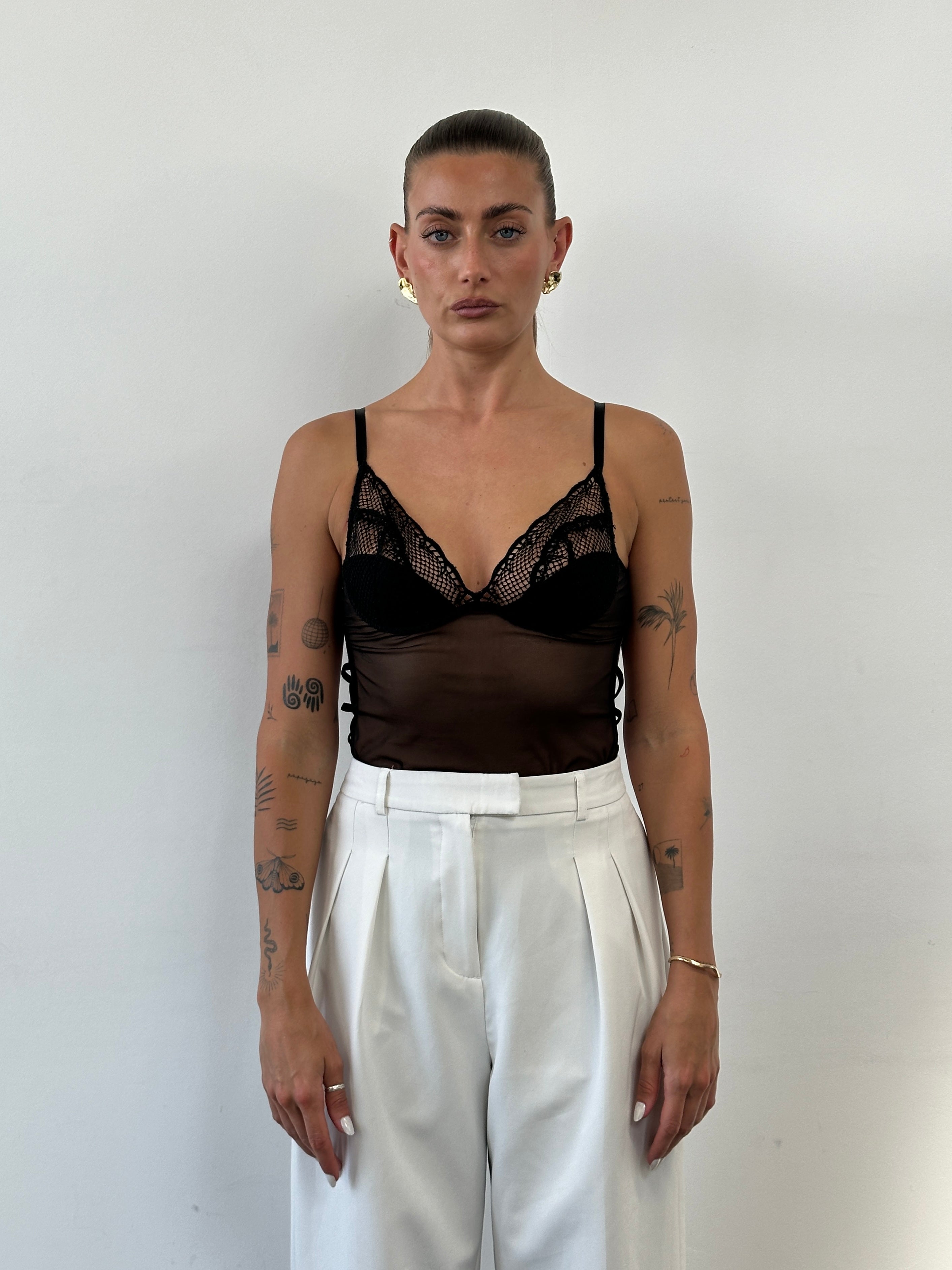 Vintage Italian vintage sheer babydoll lingerie top in size S, featuring delicate, lightweight fabric and elegant design.