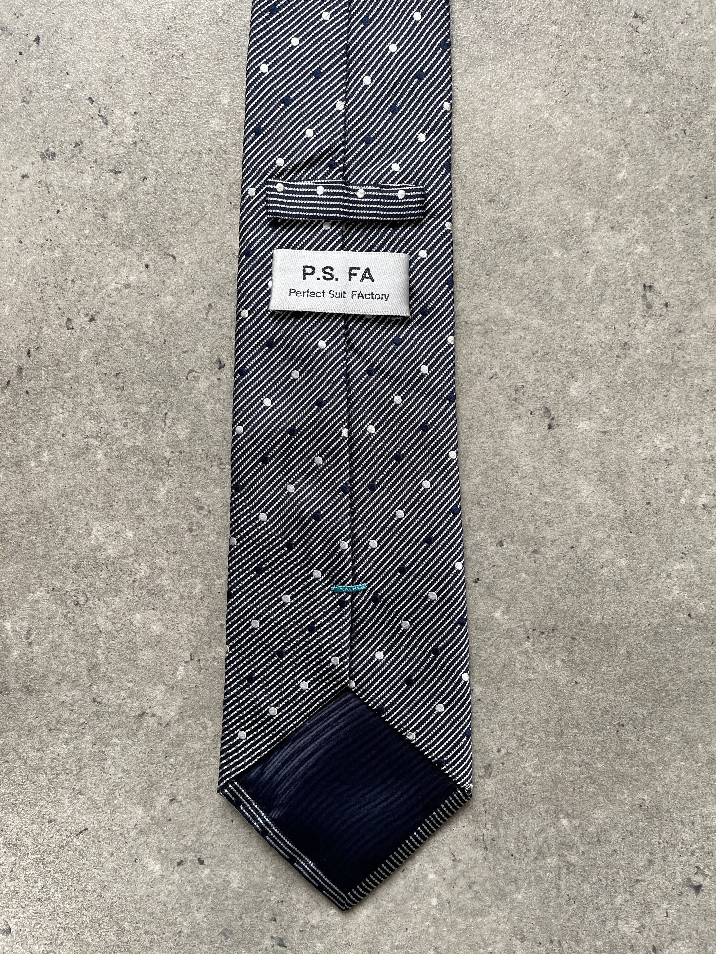 Vintage 2000s pure silk polkadot stripe tie, showcasing classic design with polka dots and stripes in vibrant colors.