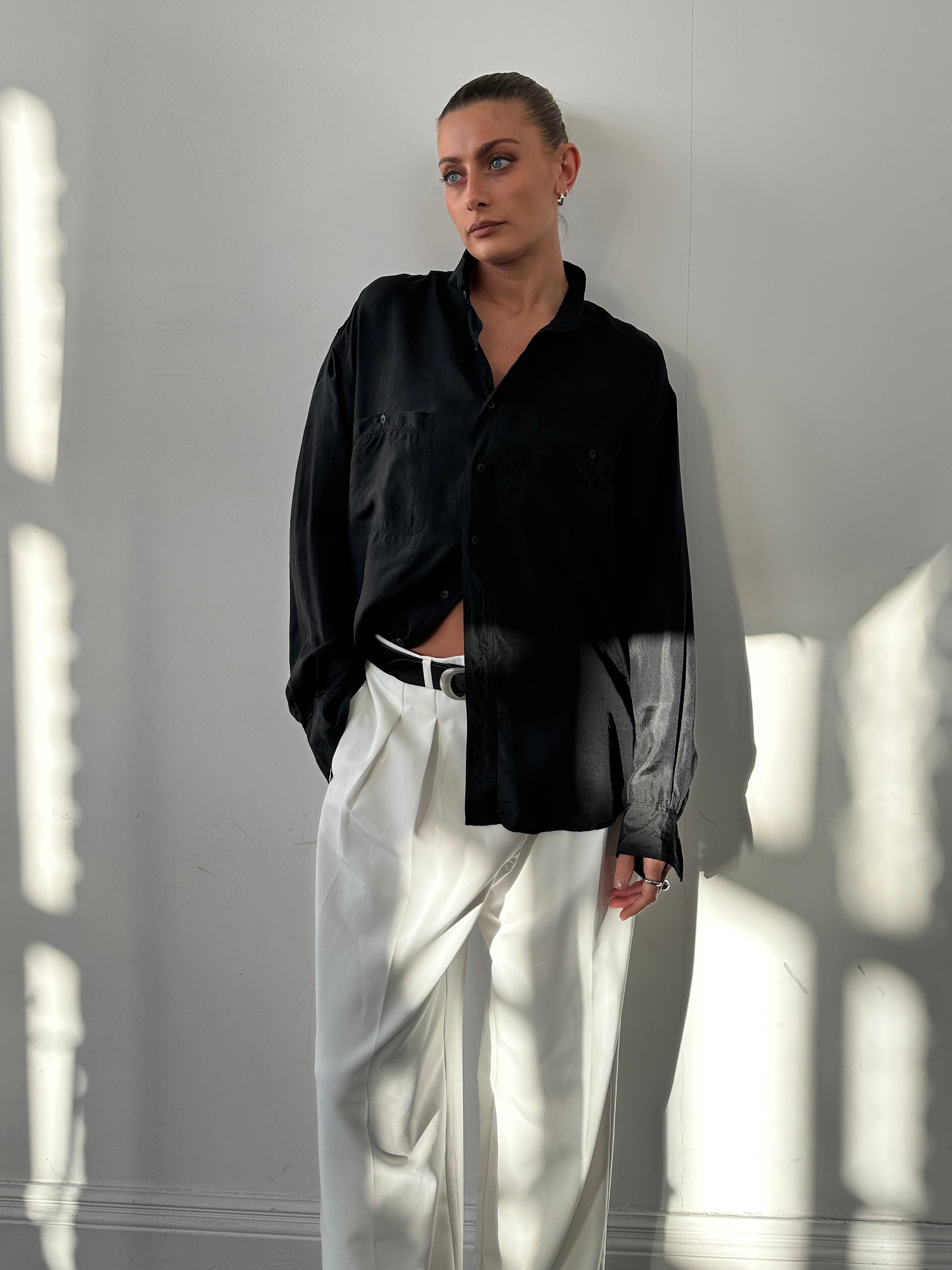 Vintage pure silk shirt in size L/XL, featuring a smooth, shiny fabric and classic collar, displayed flat on a neutral background.