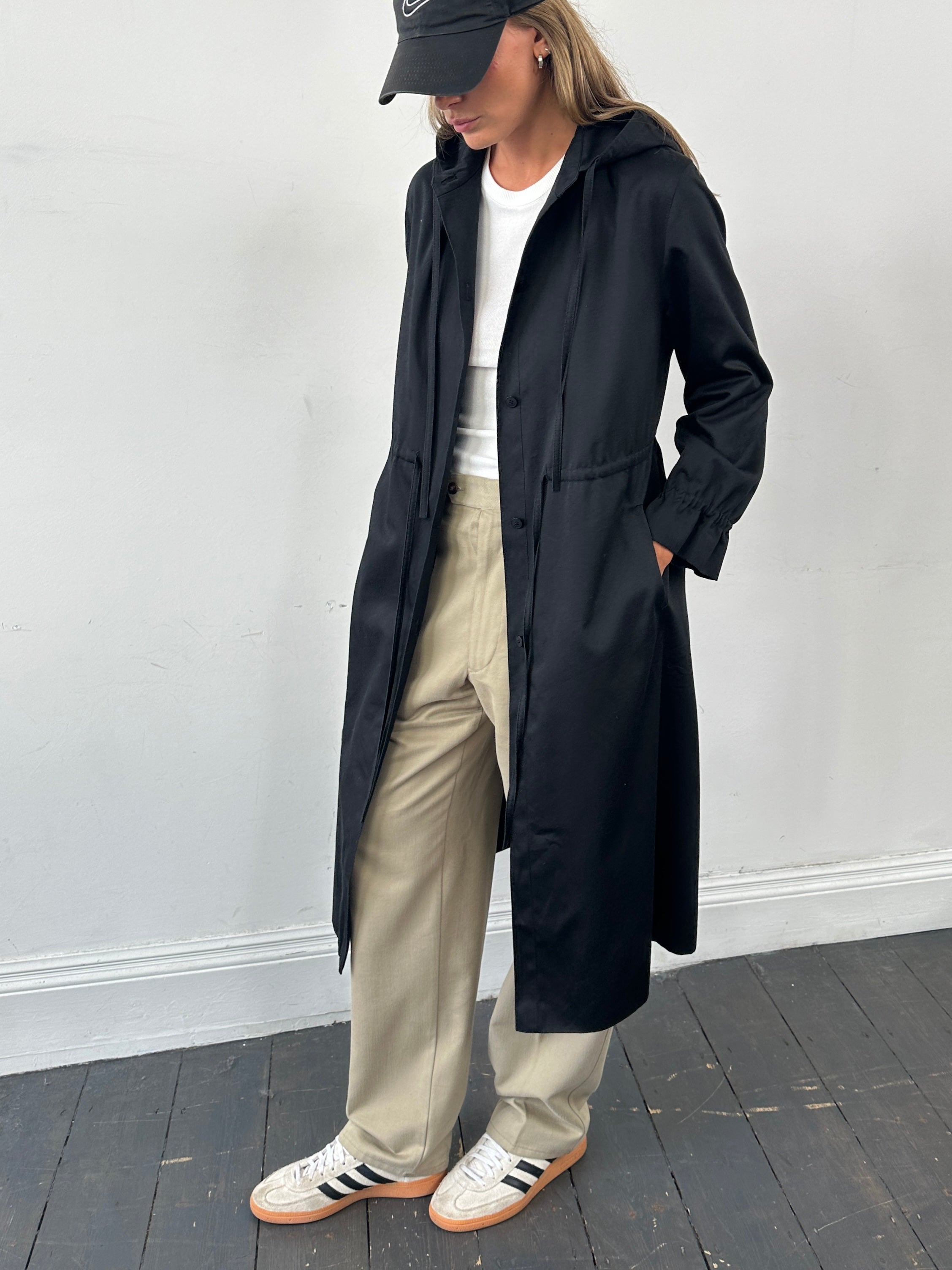 Vintage cotton tie waist hooded trench coat in size S, featuring classic design and durable fabric for a timeless look.