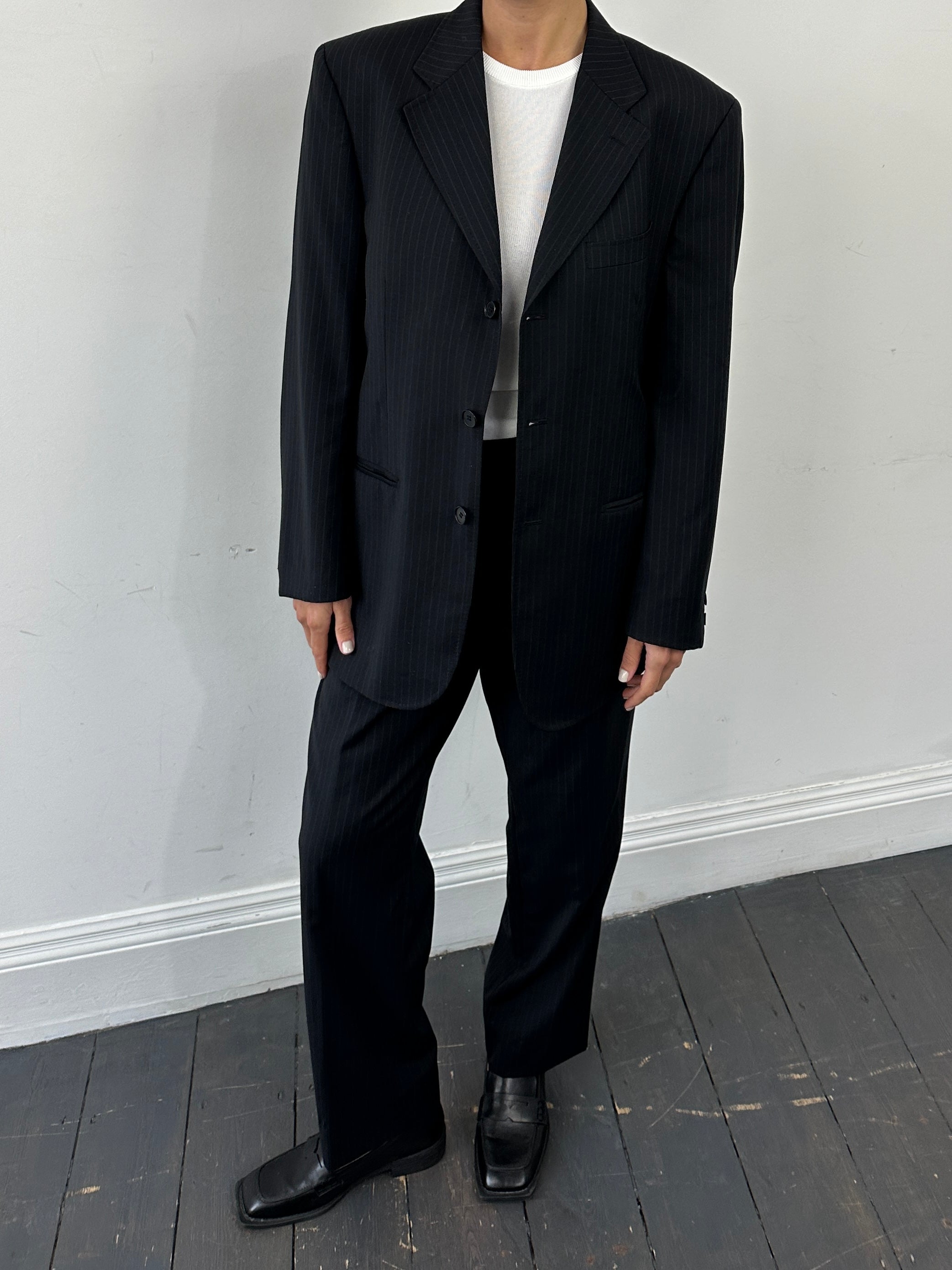 Gianfranco Ferre pinstripe pure wool single-breasted jumpsuit in size 42R/W36, tailored with a sleek, professional fit.