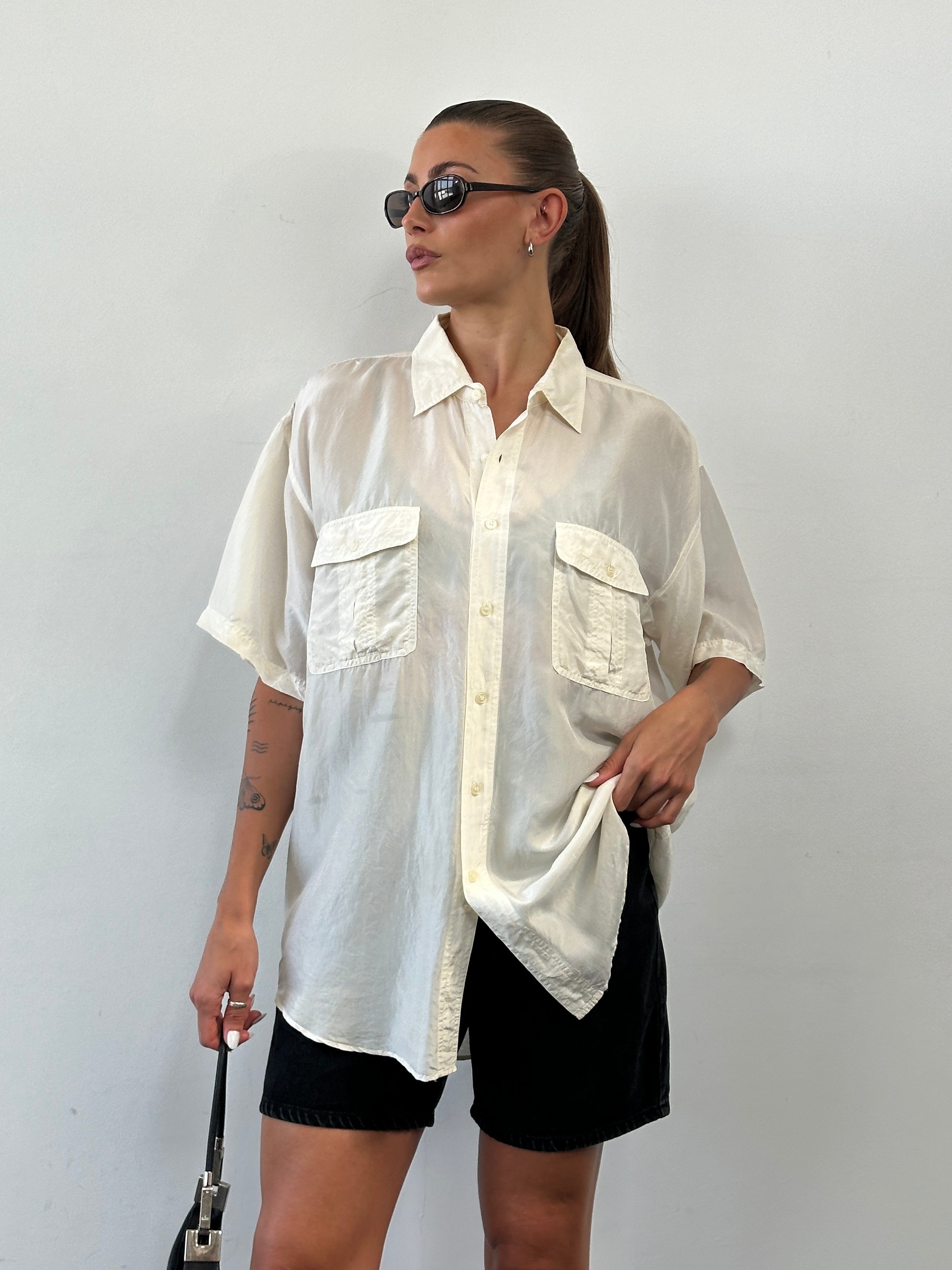 Vintage pure silk short sleeve shirt in XL, featuring a classic design and smooth fabric, displayed on a neutral background.