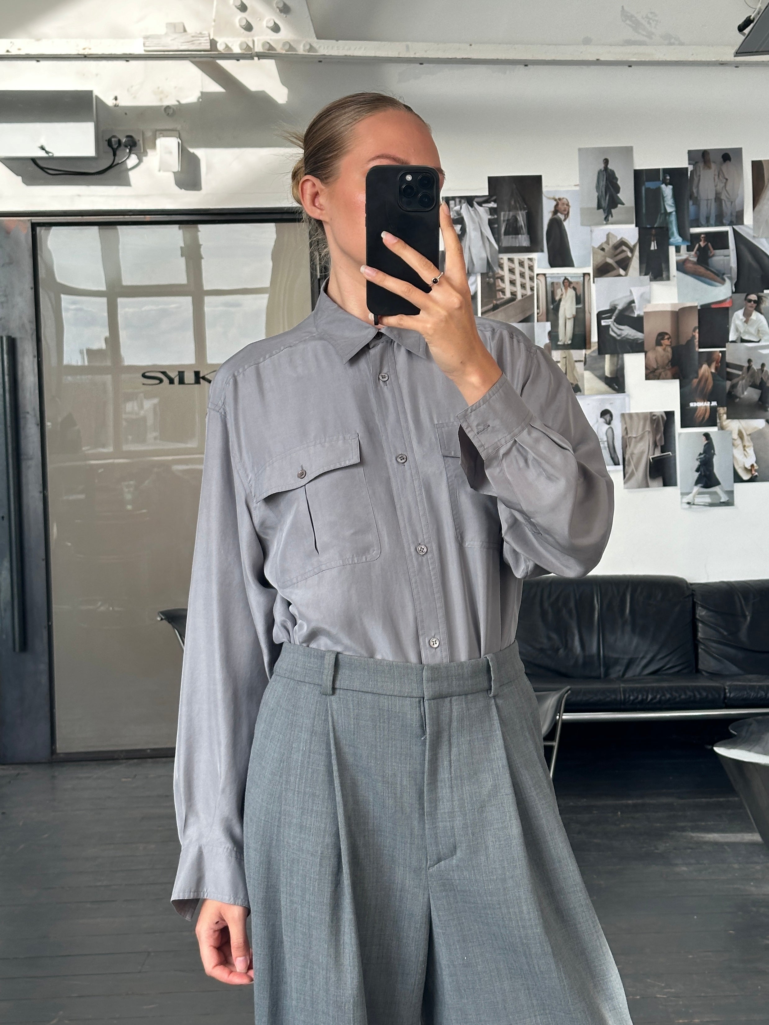 Vintage 1990s relaxed pure silk shirt in size large, featuring a classic button-up design and soft, shiny fabric.