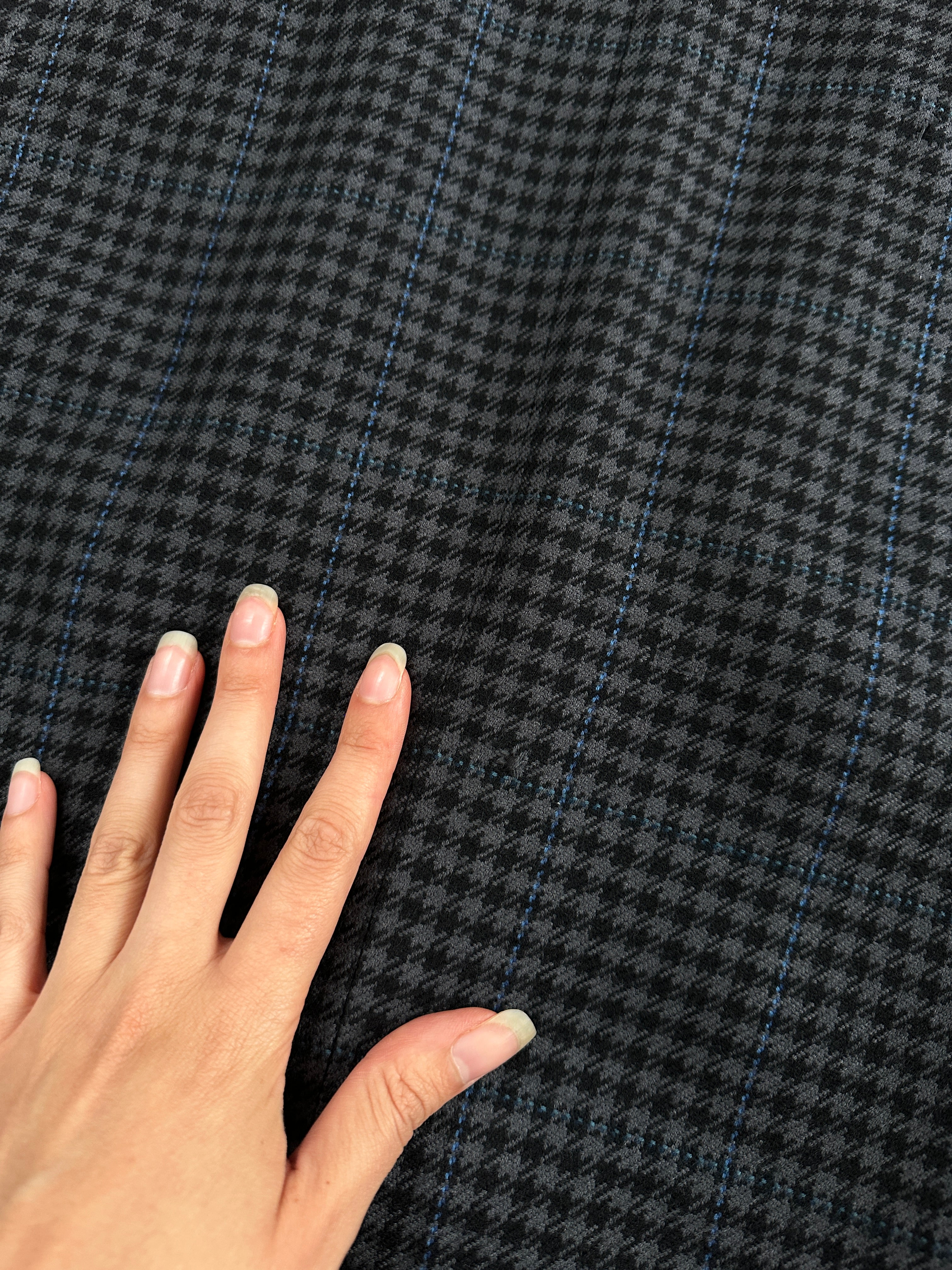 Yves Saint Laurent 1980s check brushed wool blazer in size 40R/L, featuring a classic tailored fit and vintage check pattern.