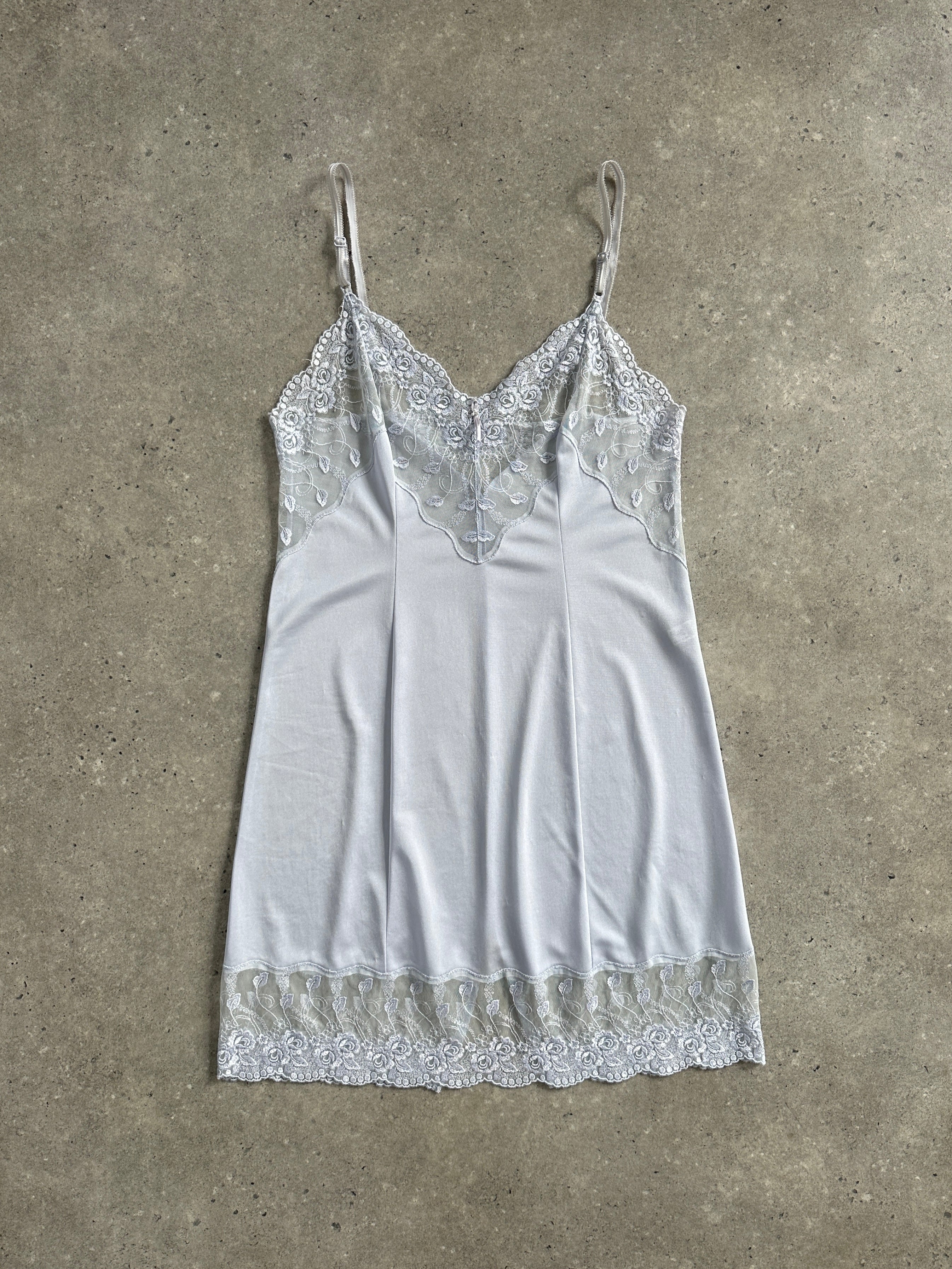 Vintage 1990s lace sheer mini slip dress, size small, featuring delicate lace and lightweight sheer fabric.