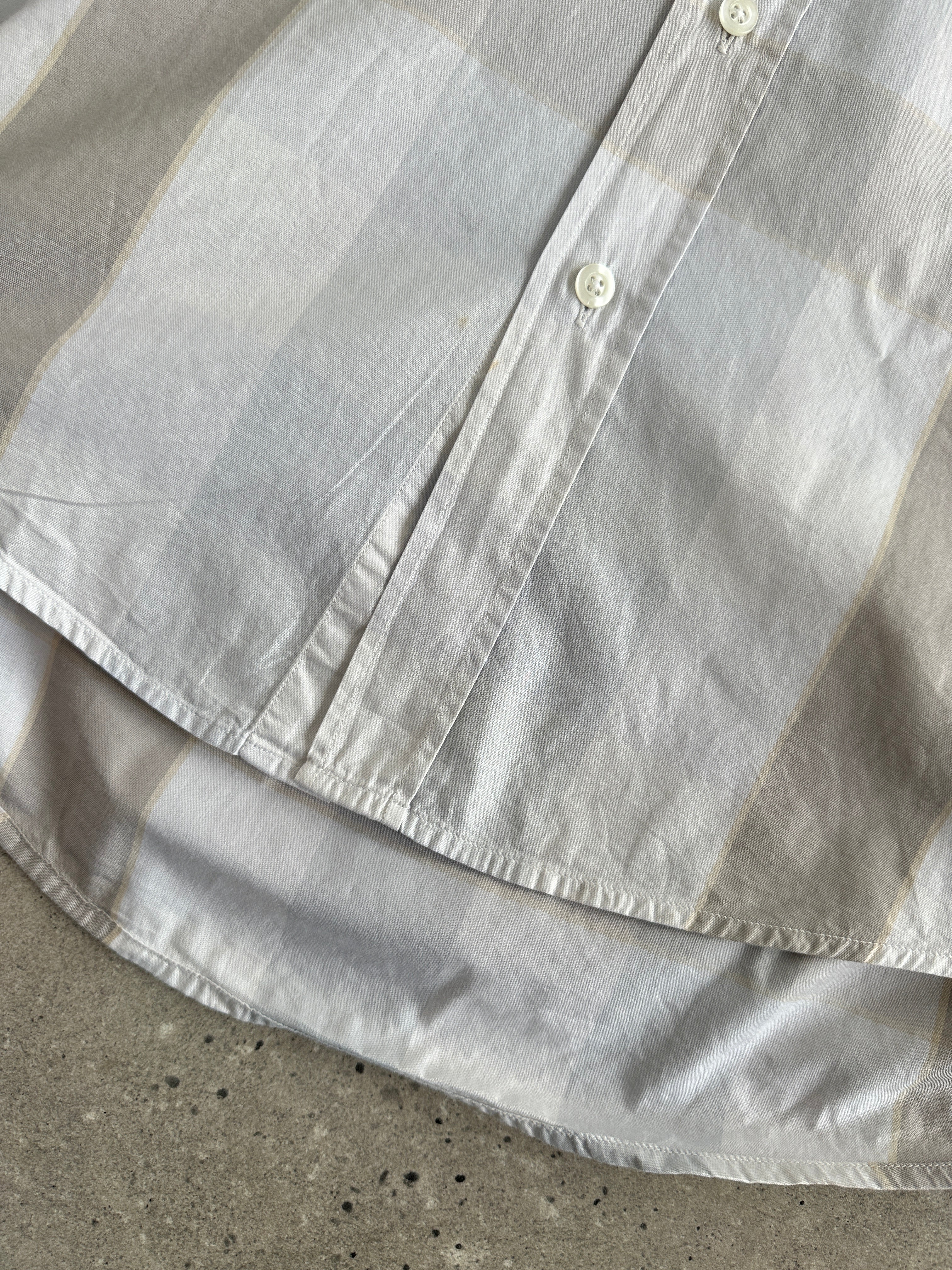 Yves Saint Laurent Pour Homme 1990s cotton check short sleeve logo shirt in XL, featuring a classic plaid pattern and button-up design.