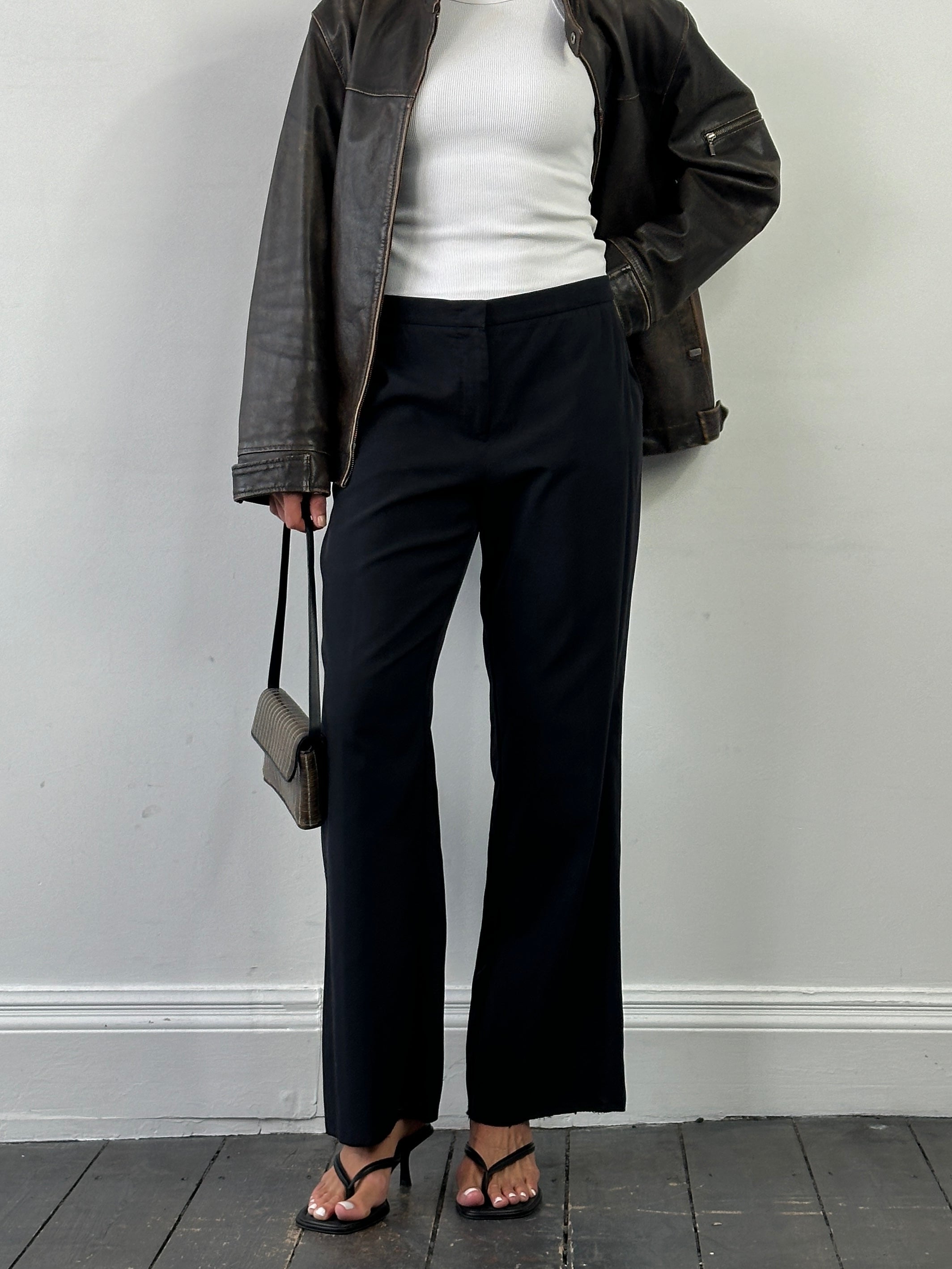 Max Mara cotton silk mid-waisted straight leg trousers in beige, shown on a hanger with a clean background.