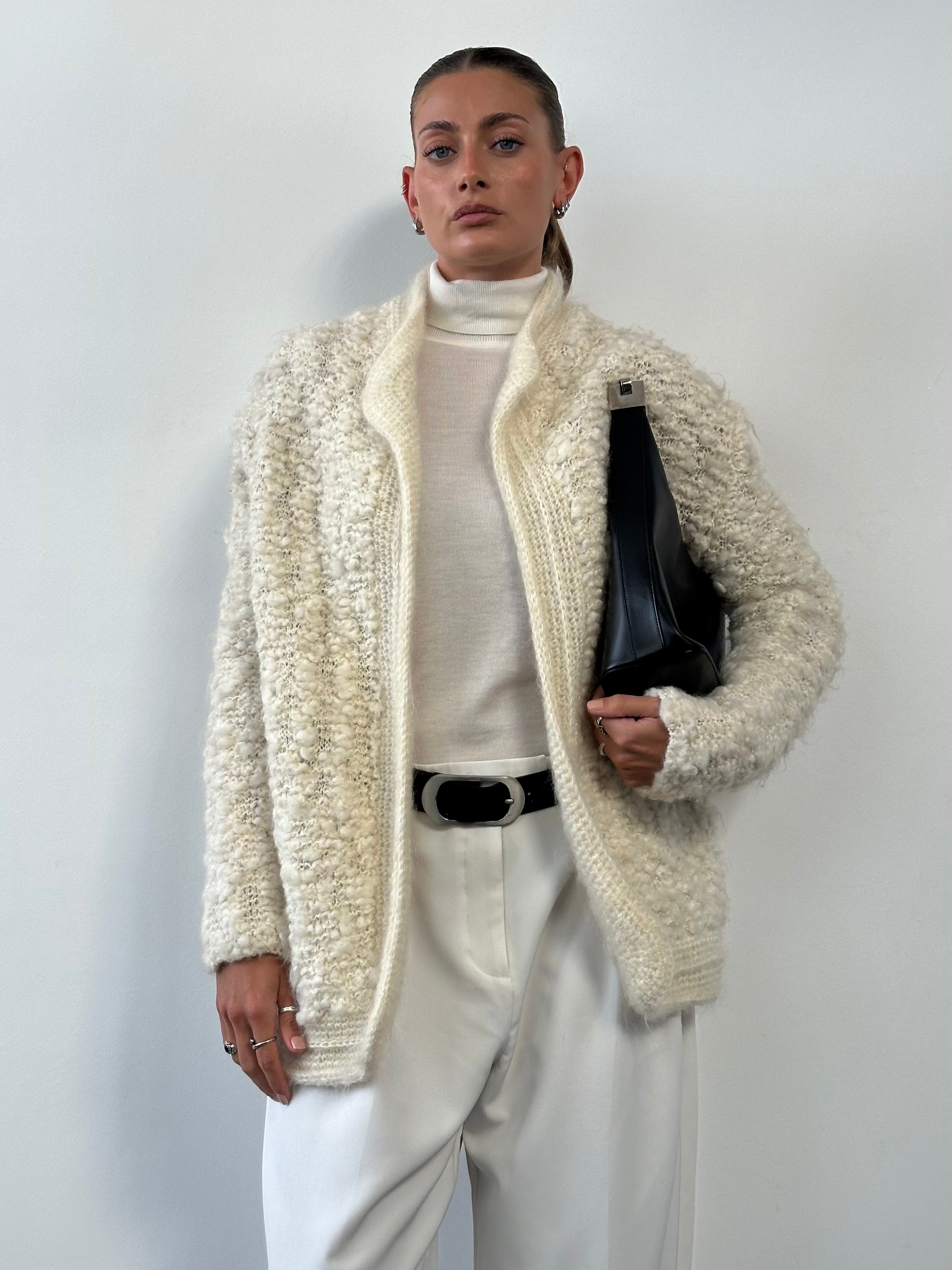 Vintage wool mohair knitted cardigan in XL, featuring a classic design with textured knit pattern and cozy fit.