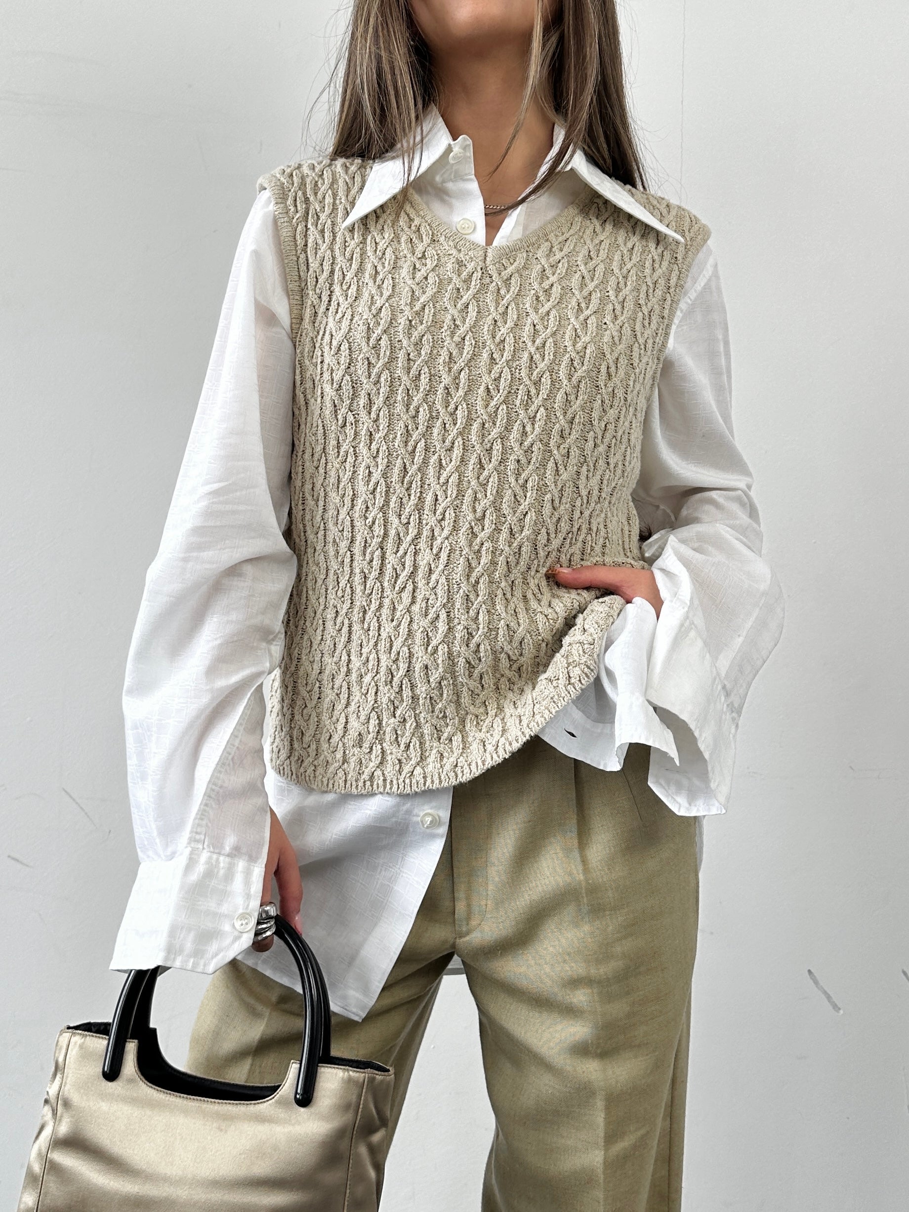 Vintage cotton Aran knit vest in size S/M, featuring textured cream-colored knit with a classic, cozy design.