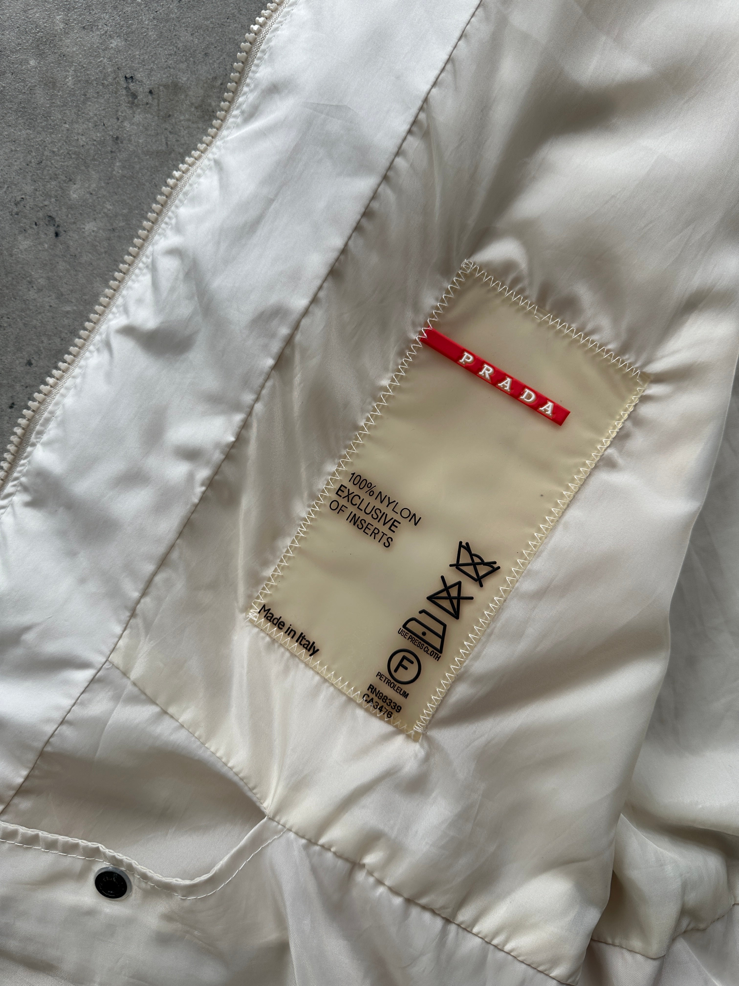 Prada sleeveless nylon vest with double zip closure, in XL size, featuring a sleek and modern gilet jacket design.