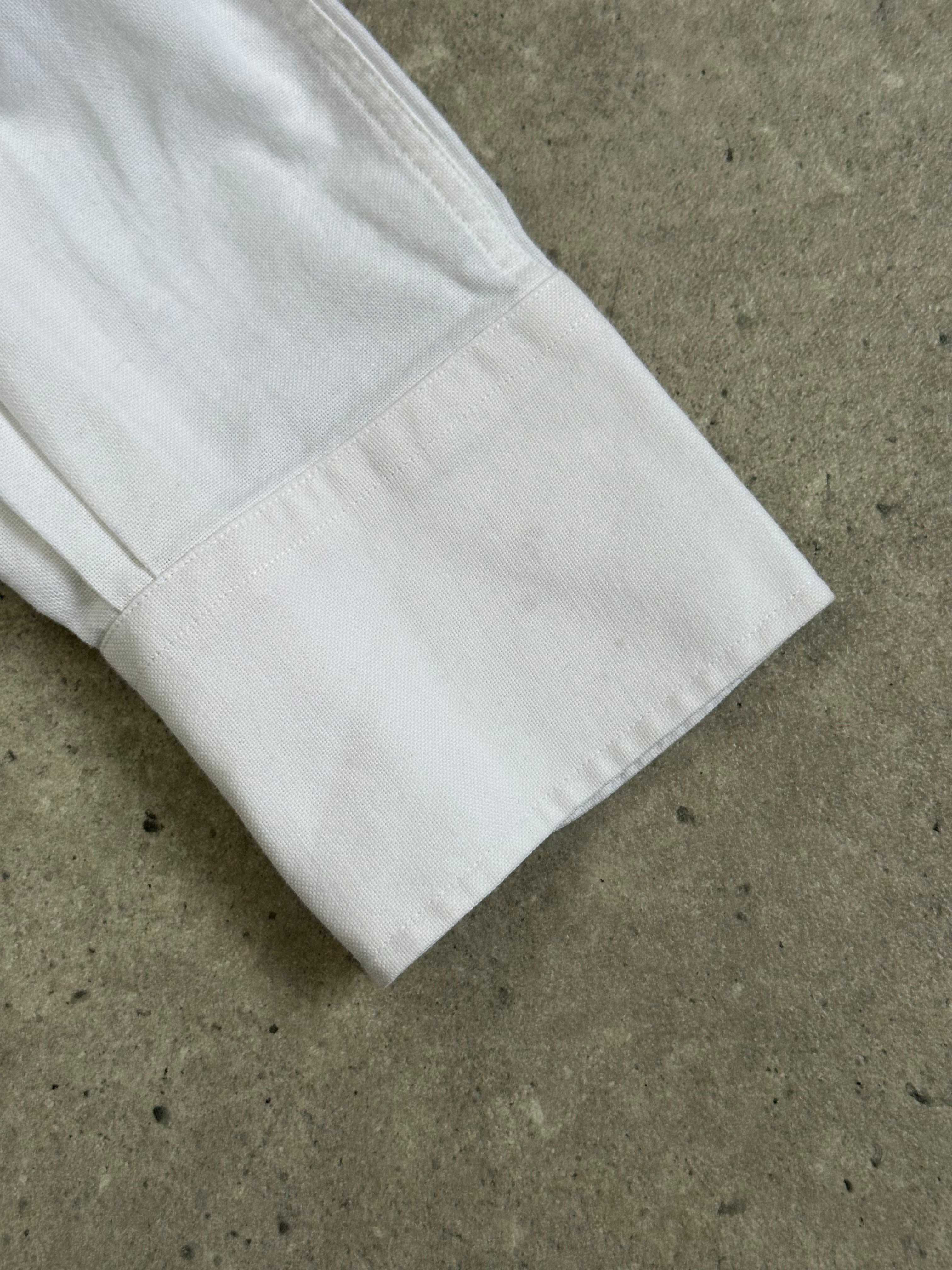 Yves Saint Laurent 1990s pure cotton shirt in size L, featuring classic design and soft fabric, displayed on a neutral background.