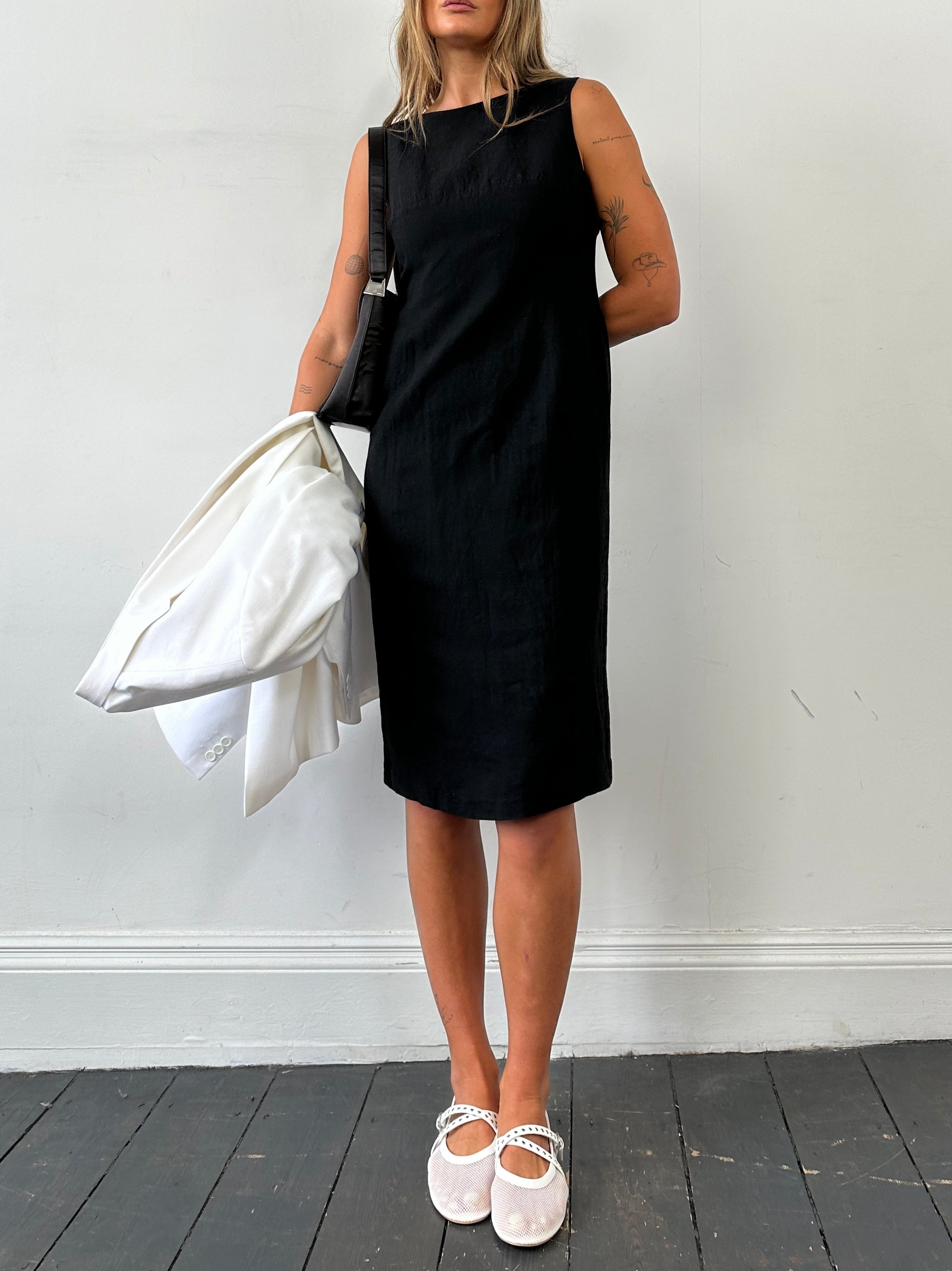 Laura Ashley linen midi shift dress in size small, featuring a stylish, breathable fabric and a classic, feminine silhouette.
