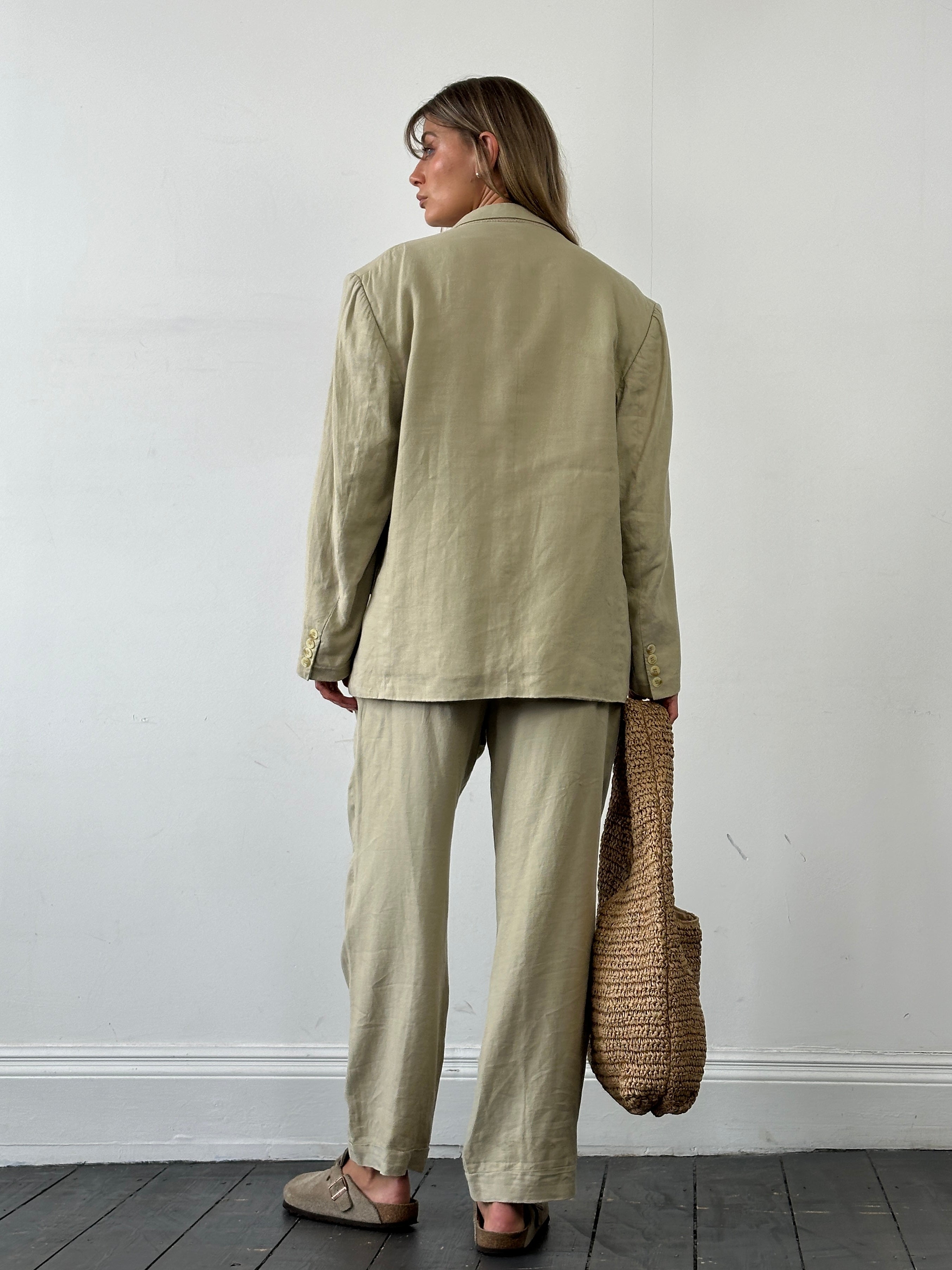 Christian Dior Monsieur pure linen single-breasted jumpsuit in size 42S, shown in a neutral color with tailored fit and classic style.