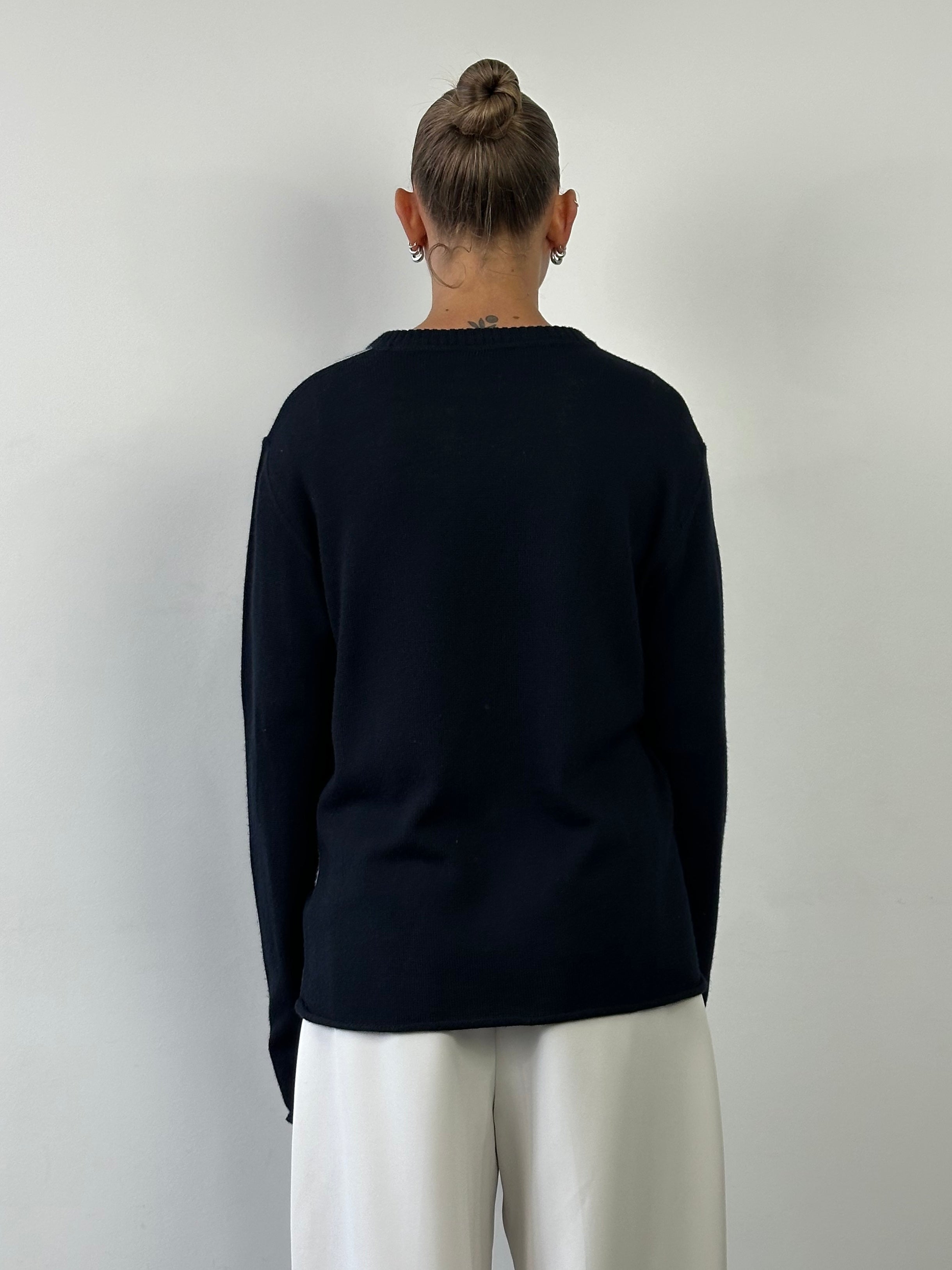 Armani Jeans virgin wool knitted logo jumper in black, featuring ribbed collar and cuffs, casual and cozy sweater for men.