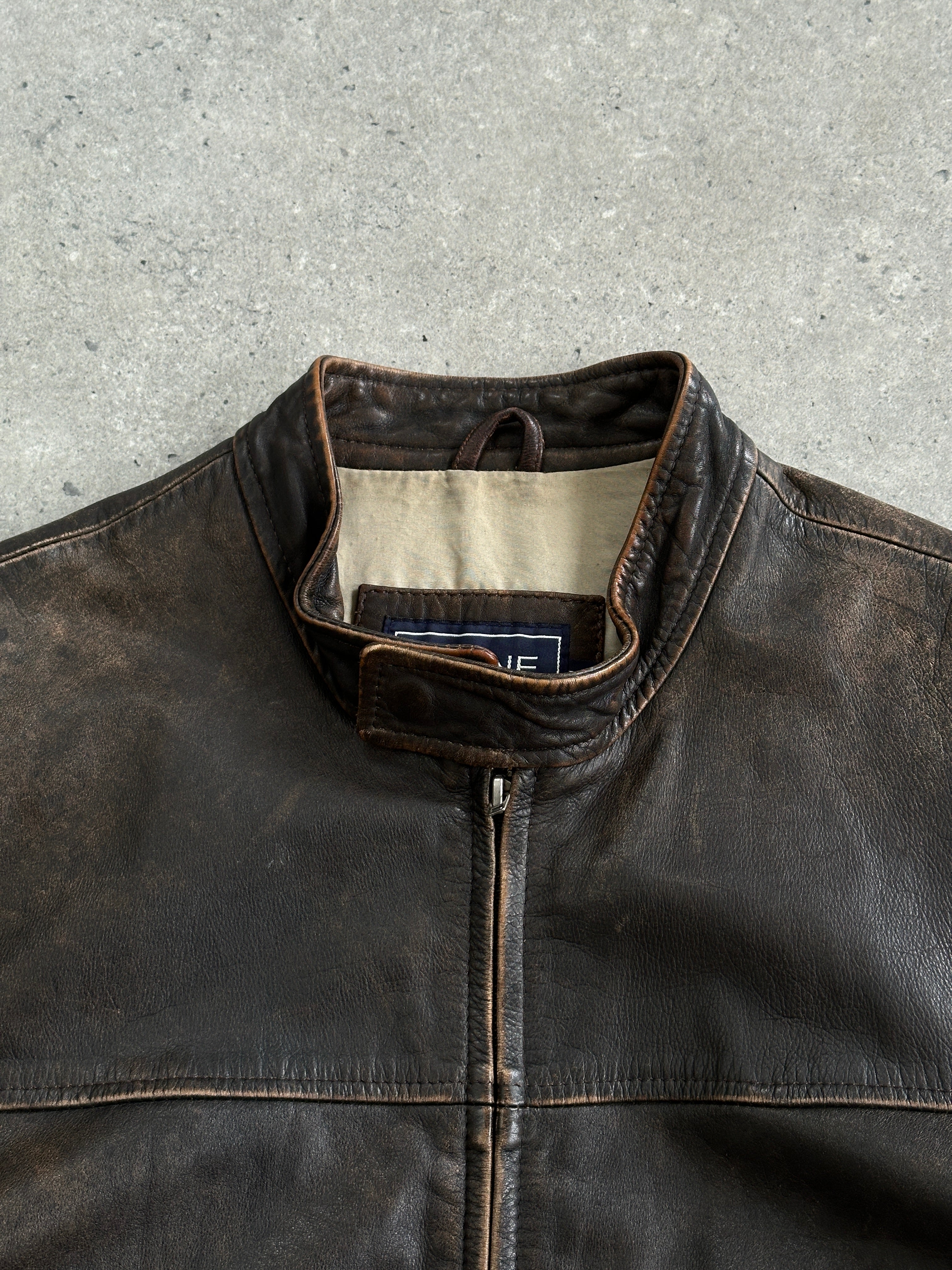 Vintage Moto aged leather jacket in size L, featuring distressed brown leather and classic motorcycle style.