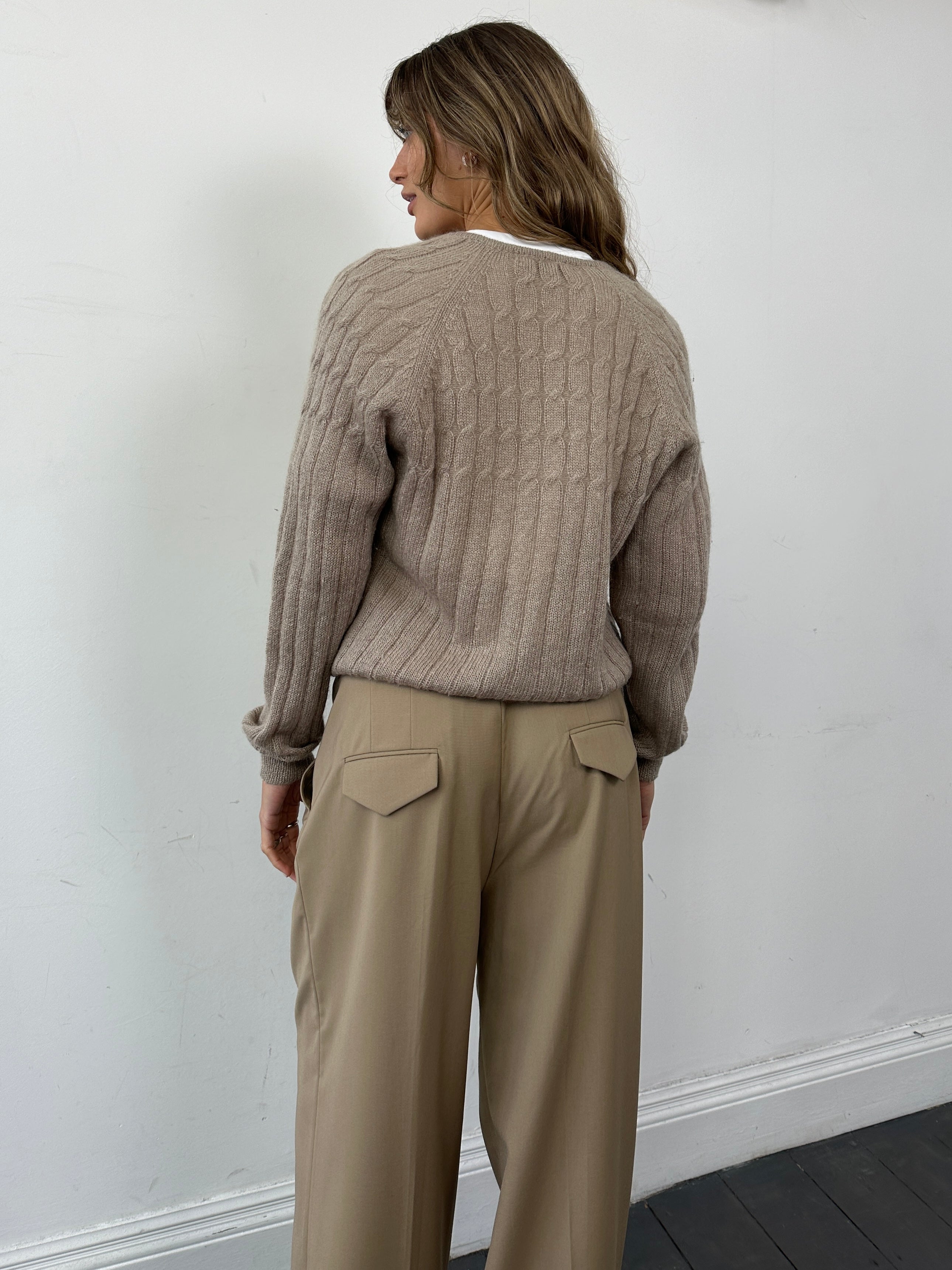 Vintage Italian mohair knitted cardigan in size M, featuring a cozy, textured knit with a button-up front and classic design.