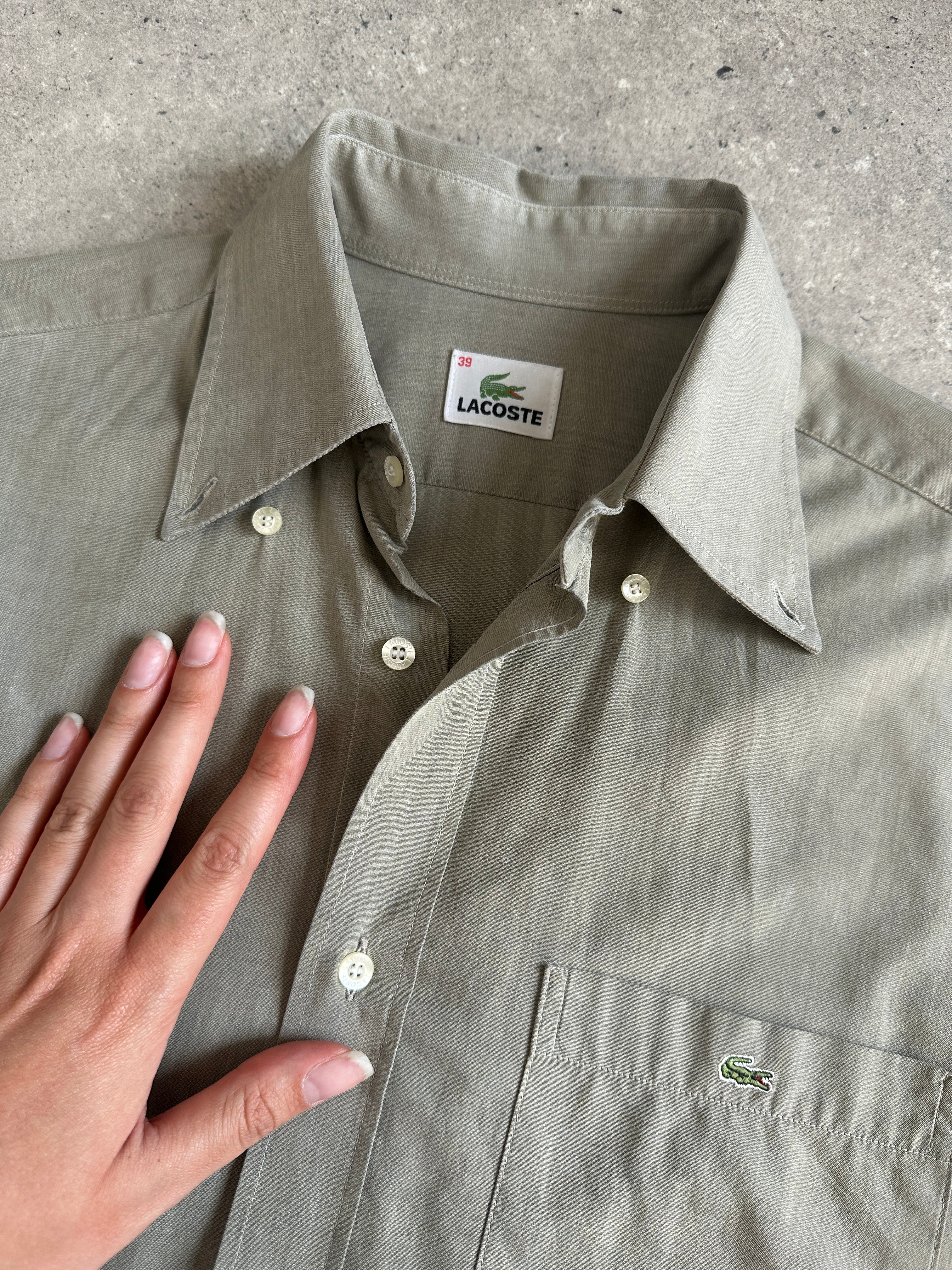 Lacoste Pure Cotton Logo Shirt in size M, featuring classic polo design with embroidered crocodile logo on the chest.