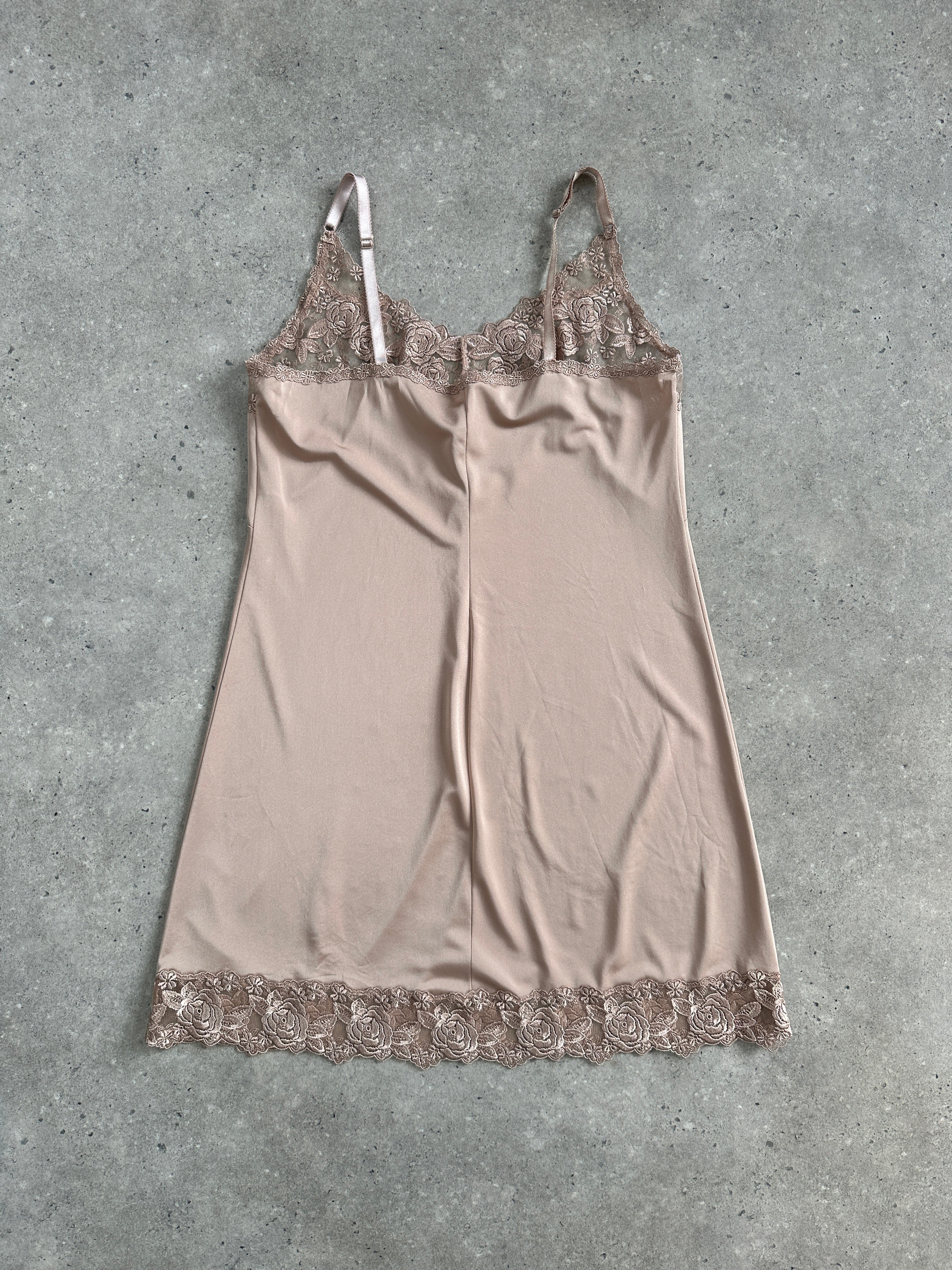 Vintage 1990s lace mini slip dress in size M, featuring delicate lace fabric and a classic retro style.