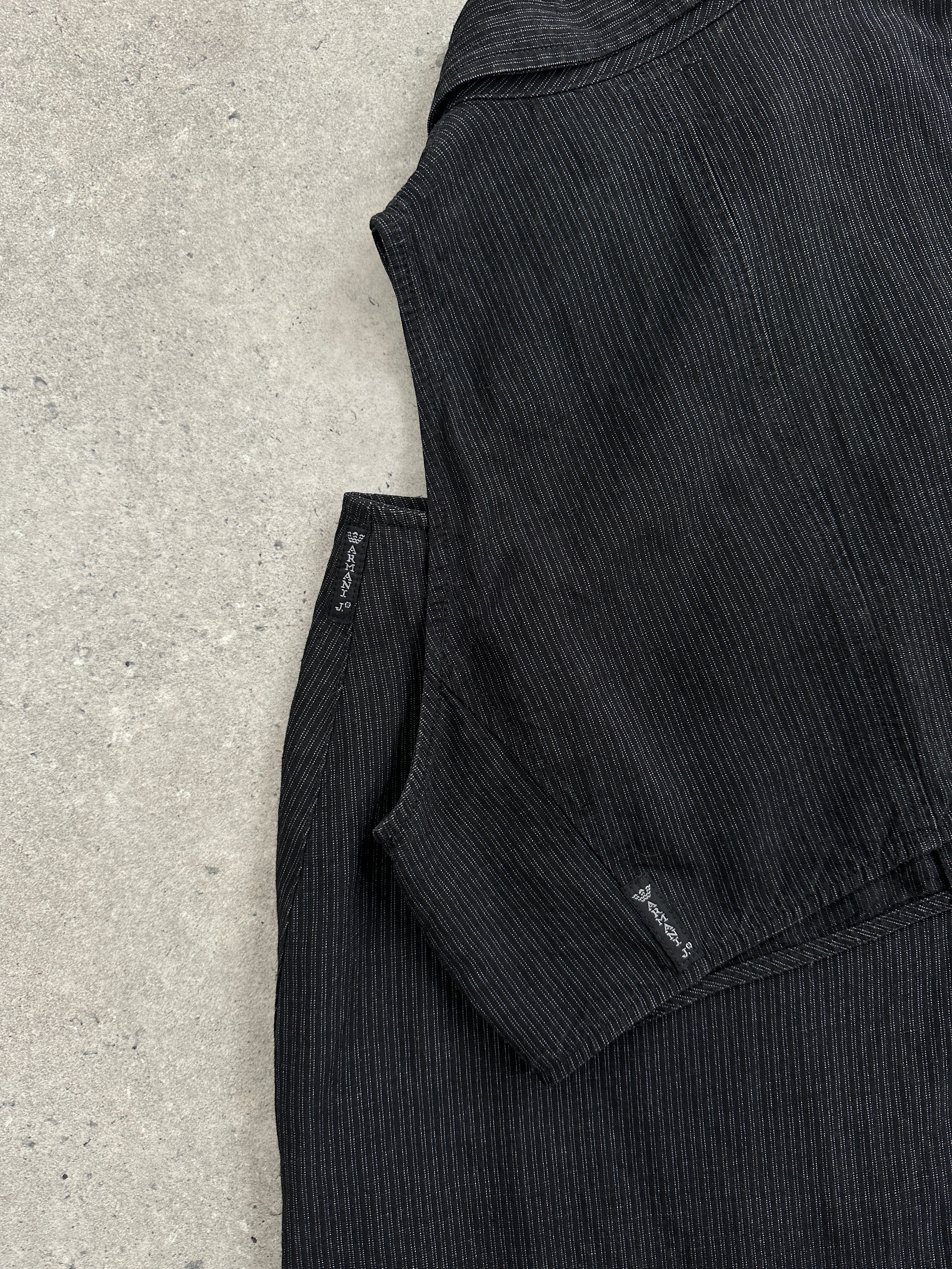 Armani Jeans linen stripe two-piece skirt set featuring a high-waisted skirt and matching top in a stylish striped pattern.