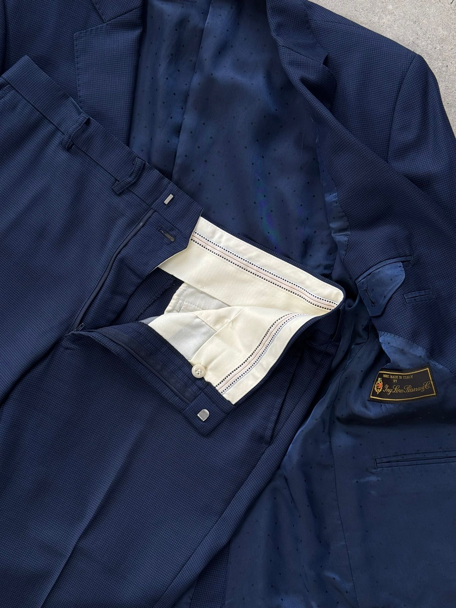 Loro Piana 2000s pure wool single-breasted suit in size 36S/W32, tailored with a classic fit, dark gray color, and smooth fabric.