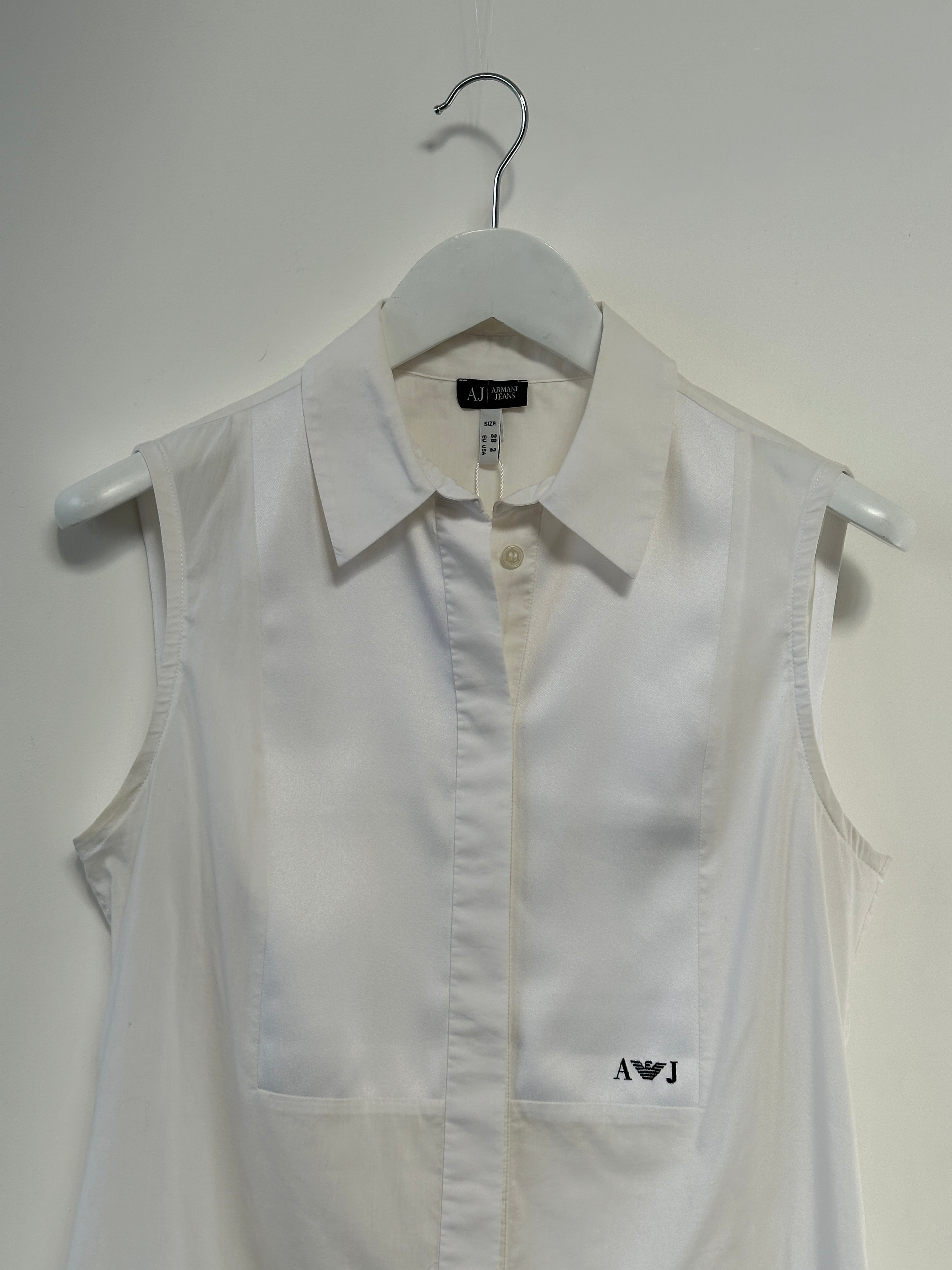 Armani Jeans sleeveless shirt in S size, featuring a casual design with a collar and button front, displayed on a hanger.