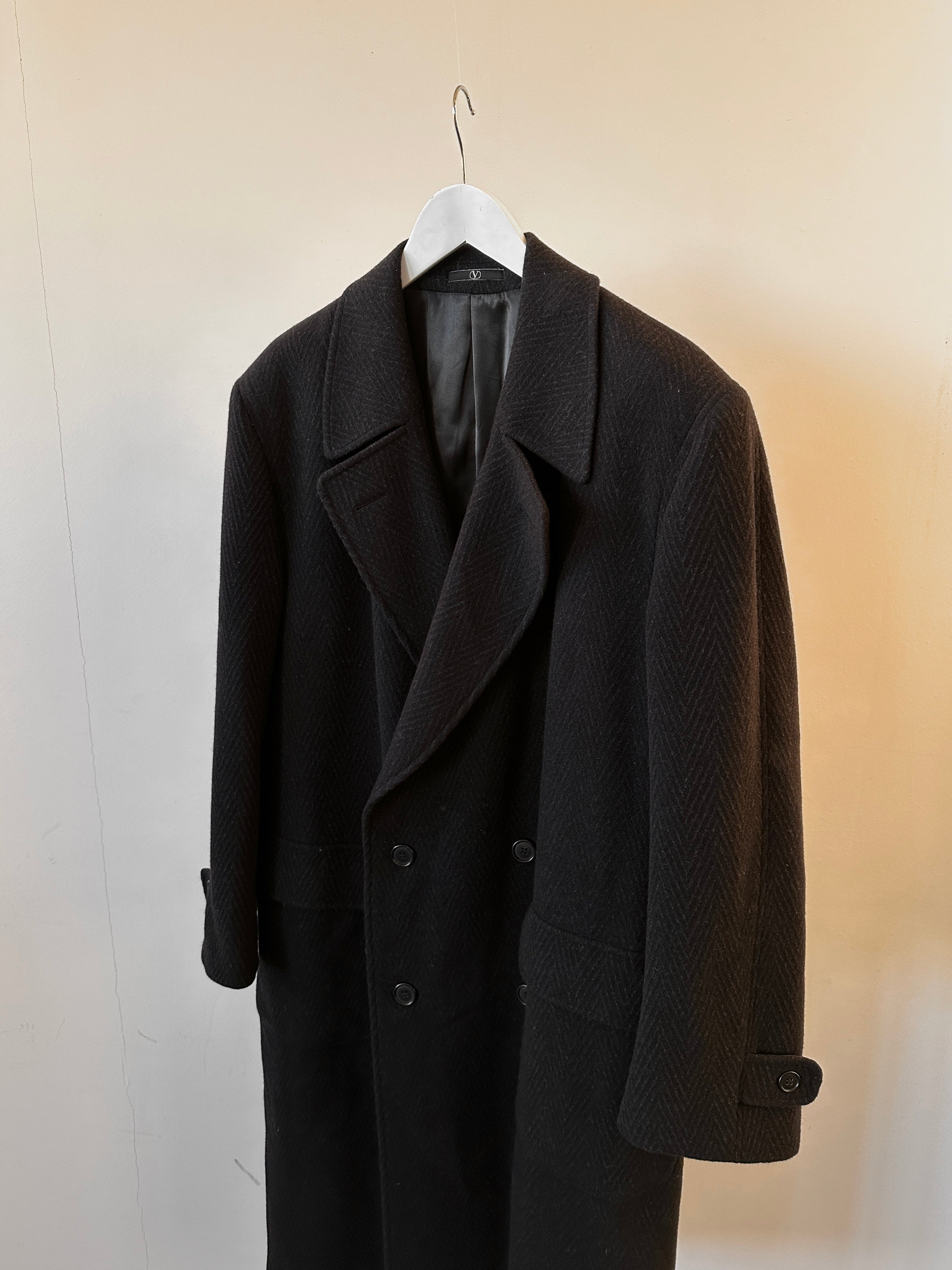 Valentino wool herringbone double-breasted coat in XL/XXL, featuring classic pattern and tailored fit, displayed on a hanger.