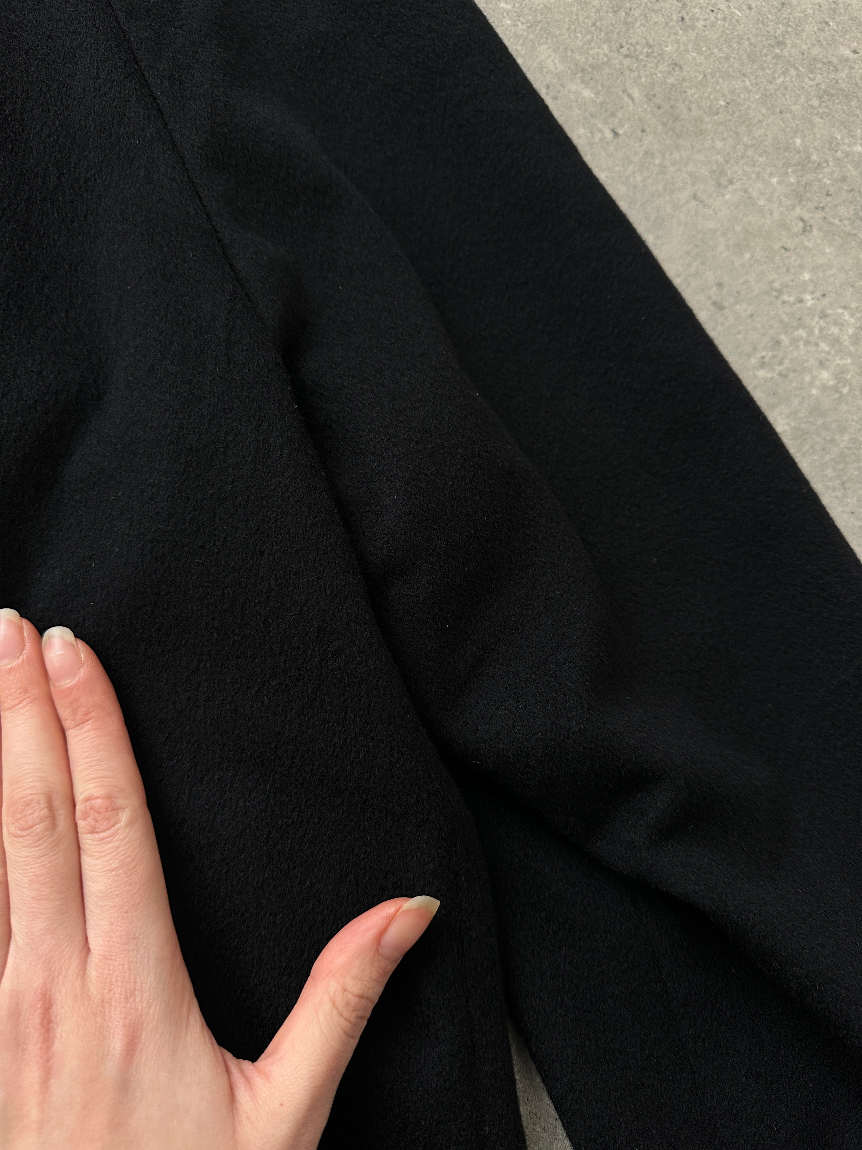 Givenchy 1990s pure wool coat with concealed placket, oversized XL fit, featuring classic tailored design and neutral color.